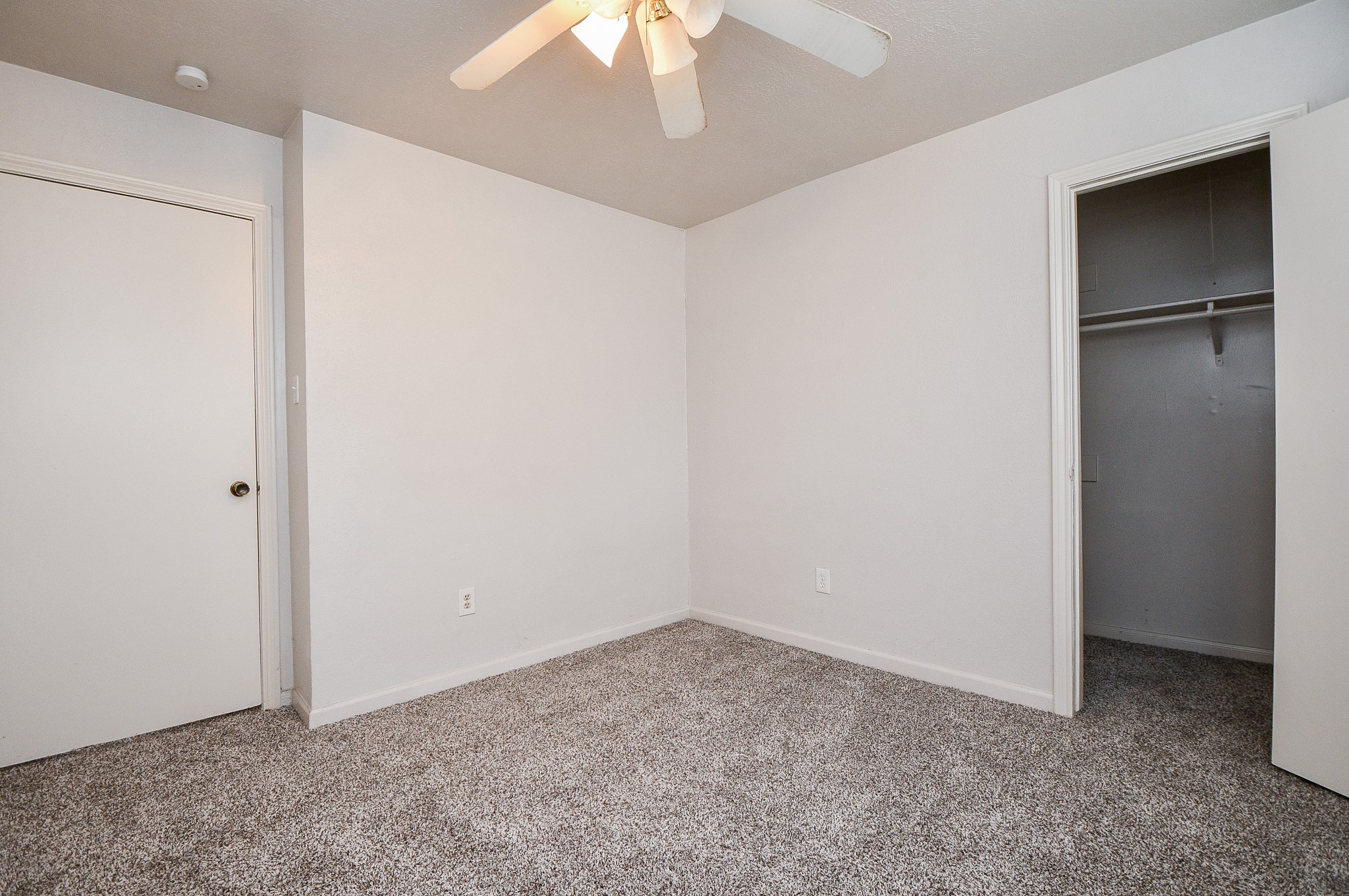 6411 Teal Run Drive Houston, TX 77035 - Photo 21 of 32 a view of an empty room with a ceiling fan