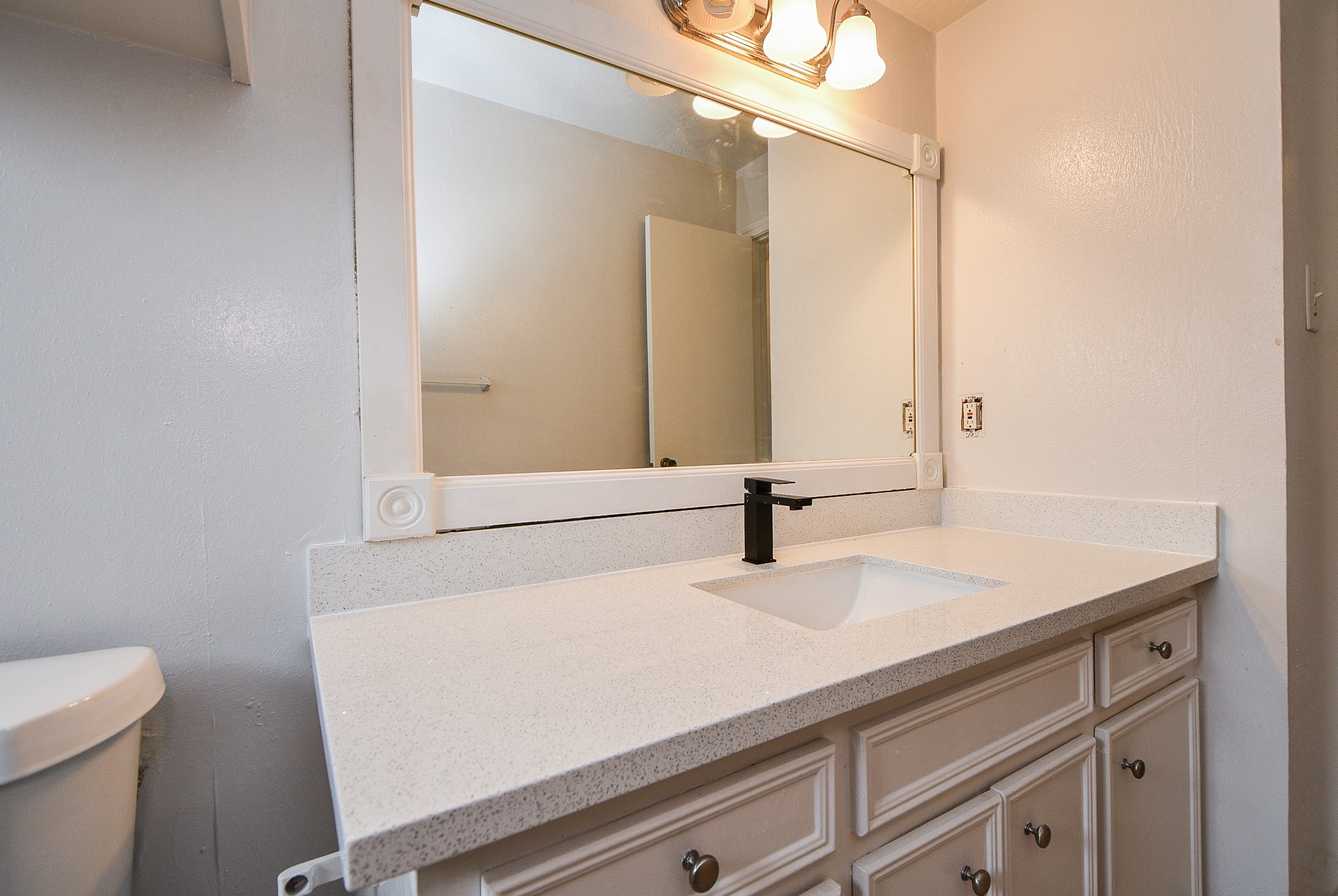 6411 Teal Run Drive Houston, TX 77035 - Photo 26 of 32 a bathroom with a sink and a toilet