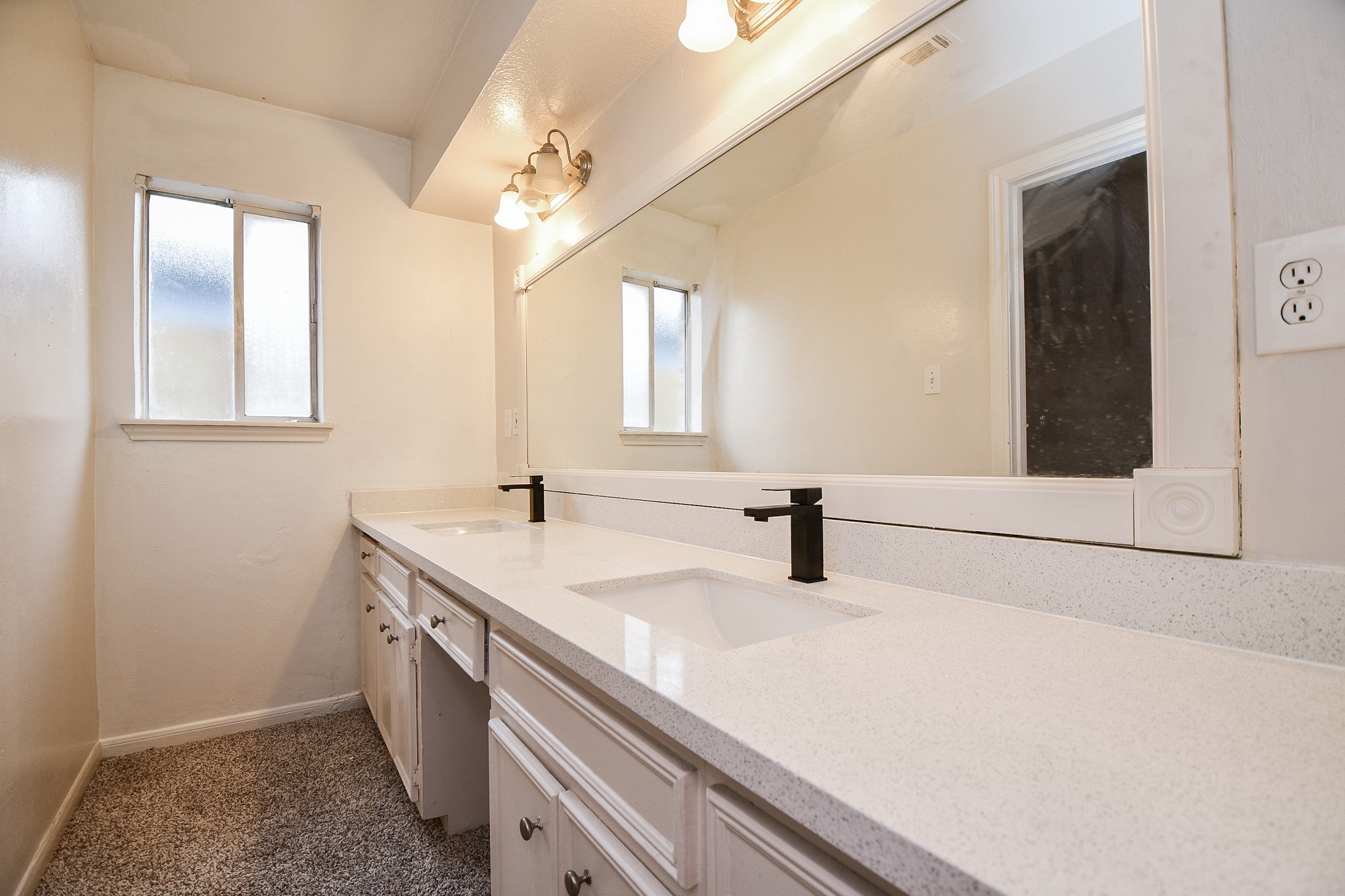 6411 Teal Run Drive Houston, TX 77035 - Photo 27 of 32 a bathroom with a sink and a mirror