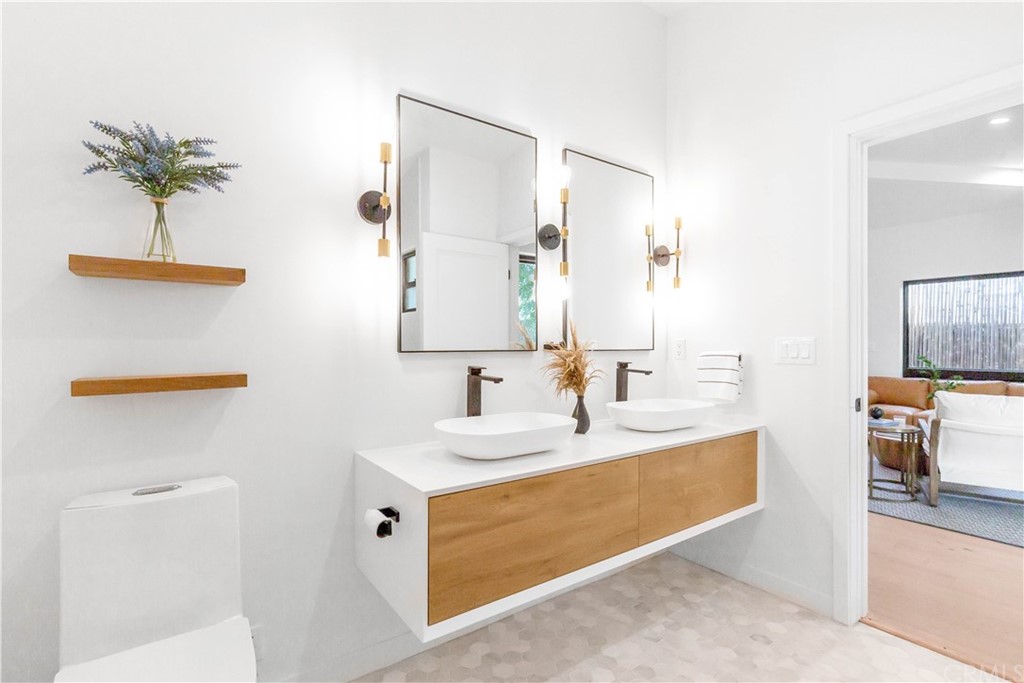 832 Mountain View Street Altadena, CA 91001 - Photo 13 of 39 a bathroom with a sink a mirror and a bathtub