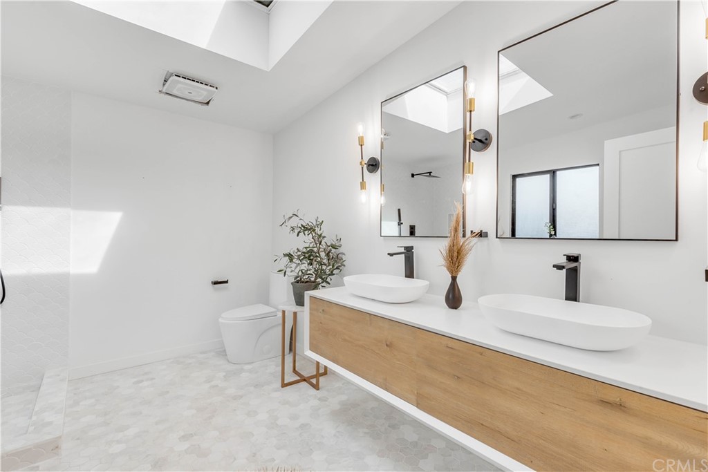 832 Mountain View Street Altadena, CA 91001 - Photo 20 of 39 a bathroom with a sink and a mirror