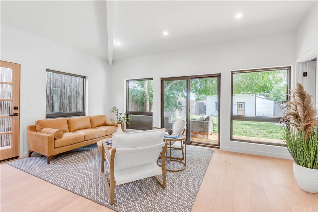 832 Mountain View Street Altadena, CA 91001 - Photo 2 of 39 a living room with furniture and a large window