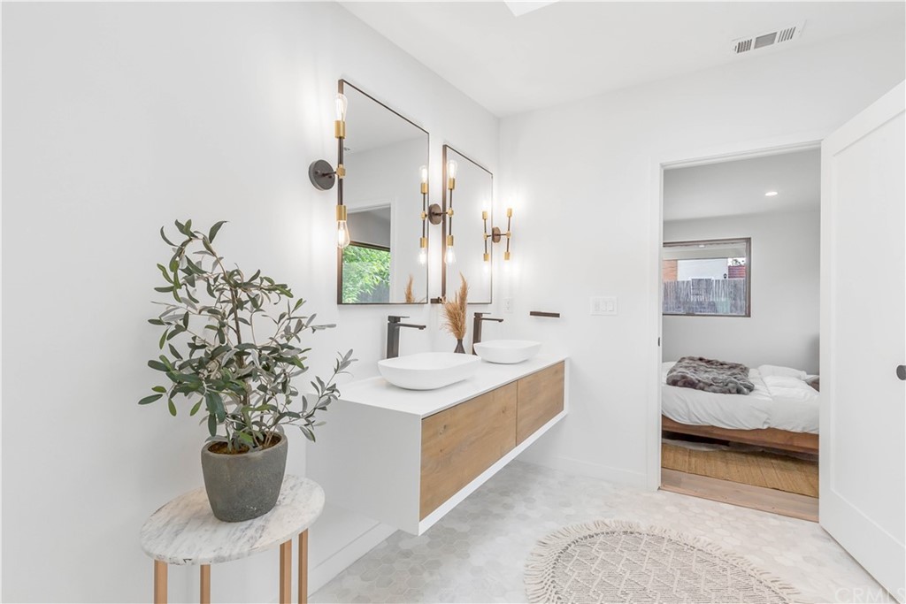 832 Mountain View Street Altadena, CA 91001 - Photo 22 of 39 a bathroom with a sink and a mirror