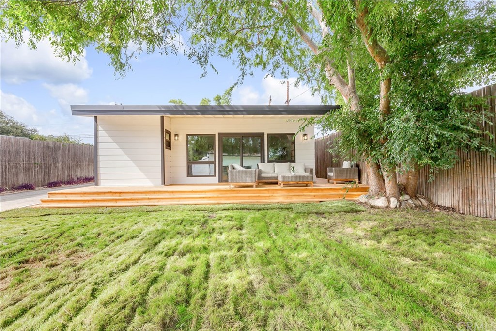 832 Mountain View Street Altadena, CA 91001 - Photo 23 of 39 a swimming pool with outdoor seating and yard