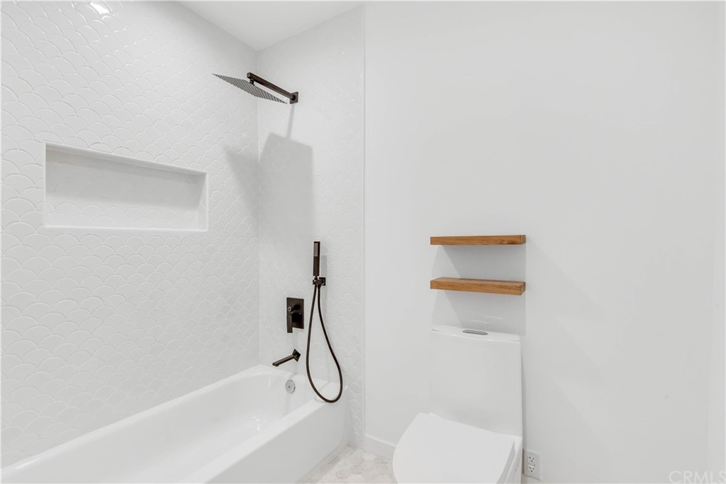 832 Mountain View Street Altadena, CA 91001 - Photo 33 of 39 a bathroom with a shower and a toilet