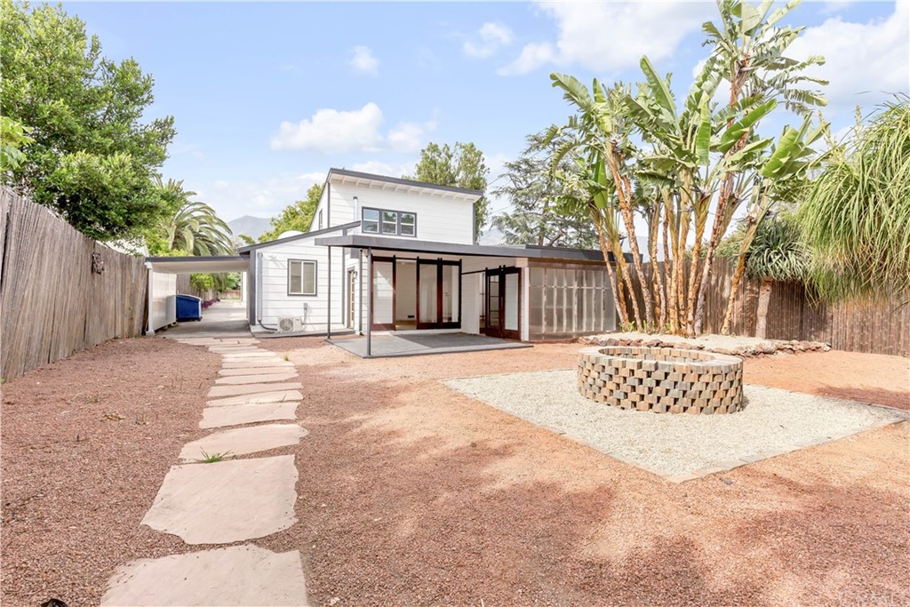 832 Mountain View Street Altadena, CA 91001 - Photo 38 of 39 a front view of a house with a garden