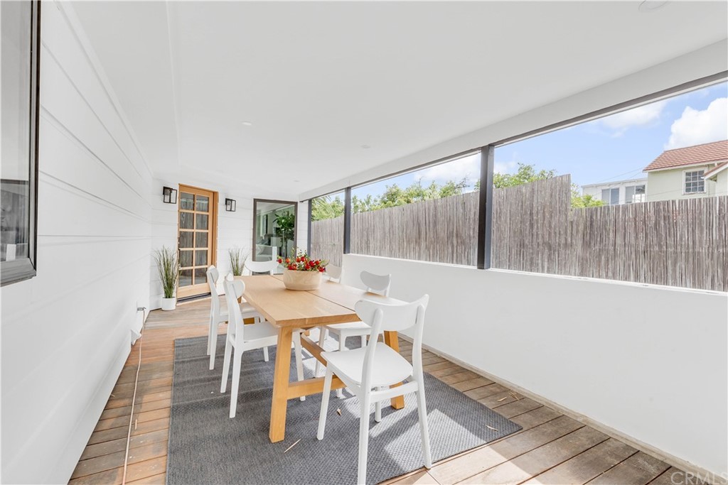 832 Mountain View Street Altadena, CA 91001 - Photo 7 of 39 a view of a dining room with furniture window and wooden floor