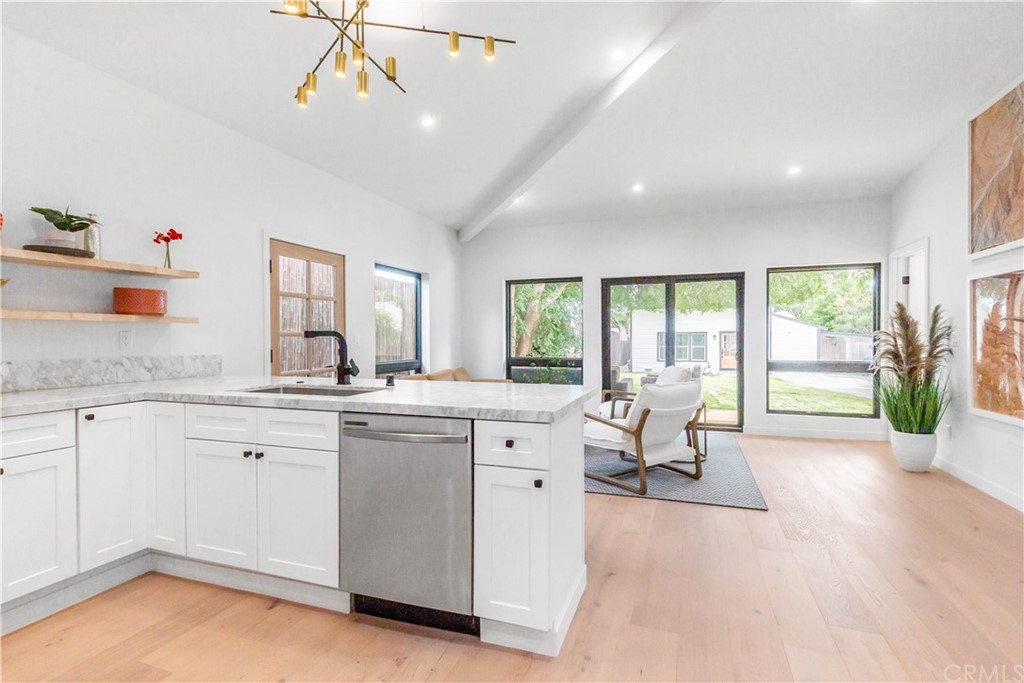 832 Mountain View Street Altadena, CA 91001 - Photo 10 of 39 a large white kitchen with a large window