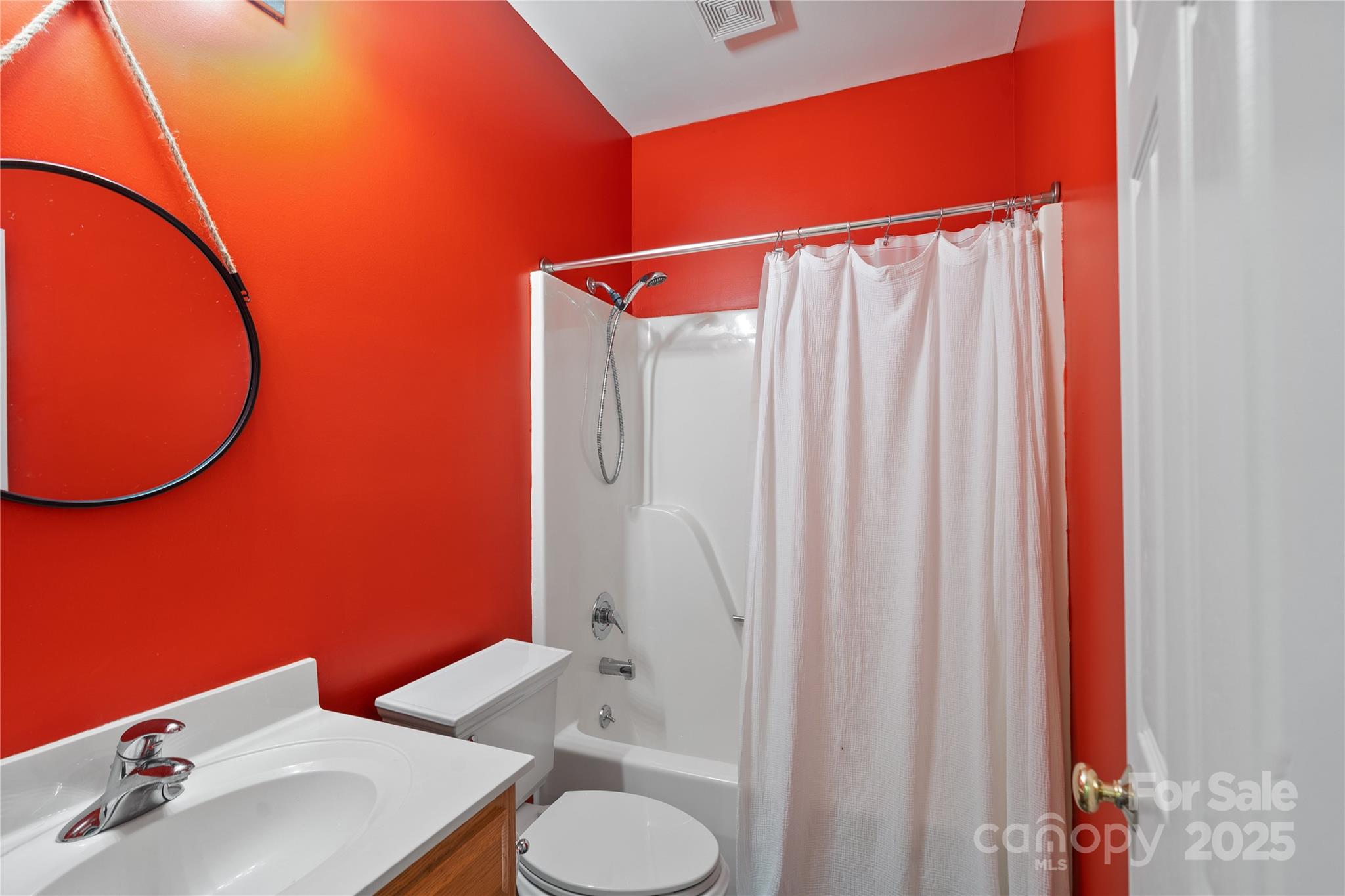 236 Woody Circle Tryon, NC 28782 - Photo 11 of 26 a bathroom with a sink and a mirror