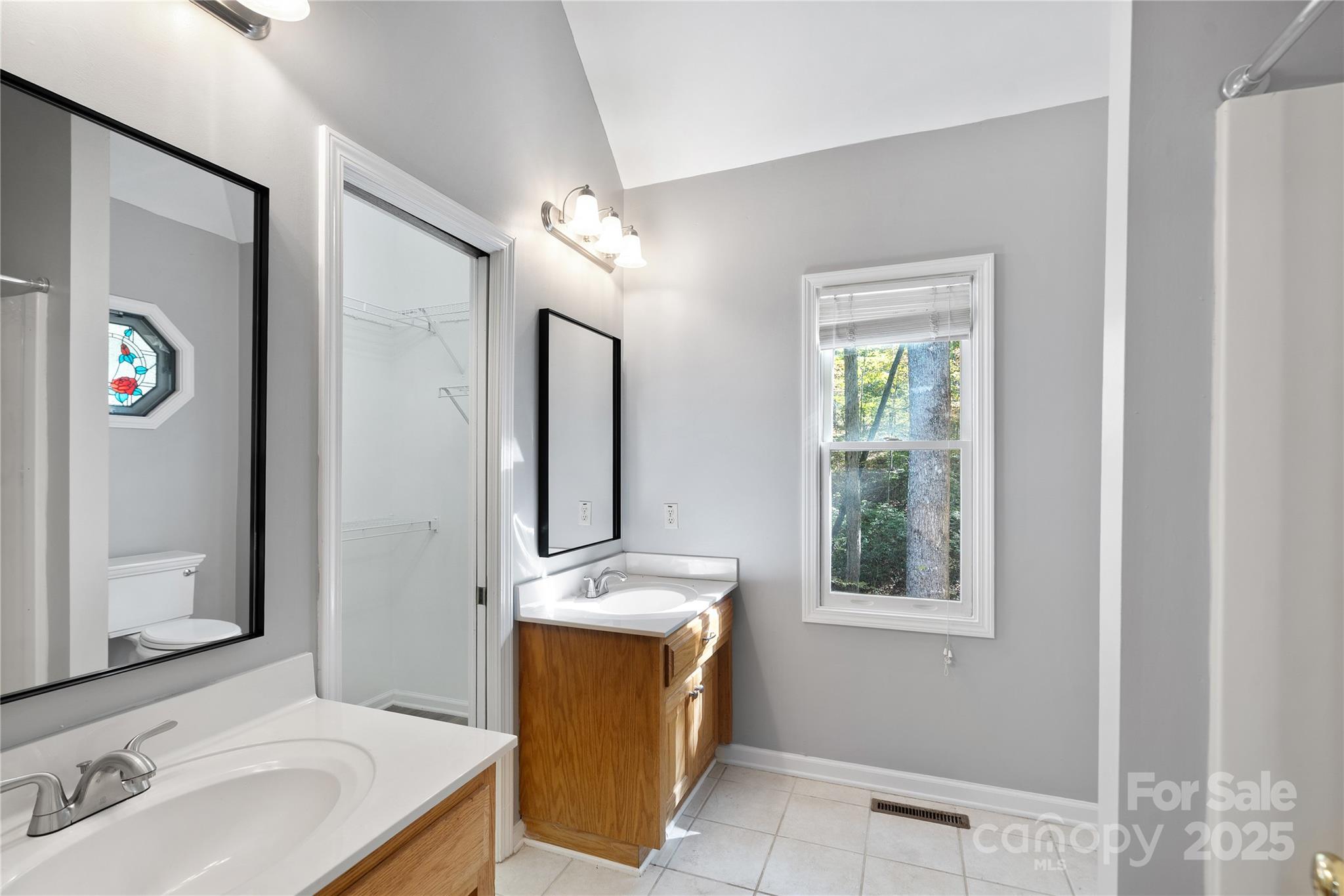 236 Woody Circle Tryon, NC 28782 - Photo 14 of 26 a bathroom with a sink and a mirror