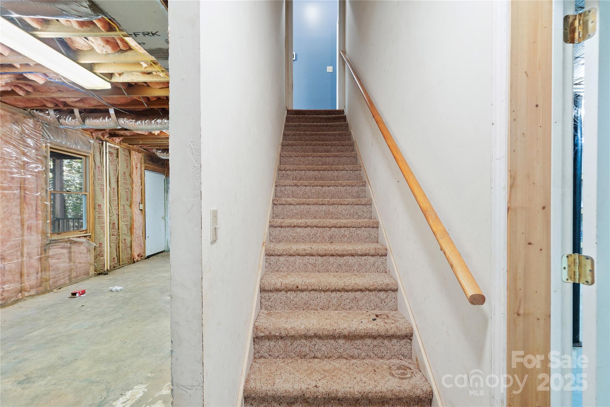 236 Woody Circle Tryon, NC 28782 - Photo 17 of 26 a view of staircase with railing and white walls