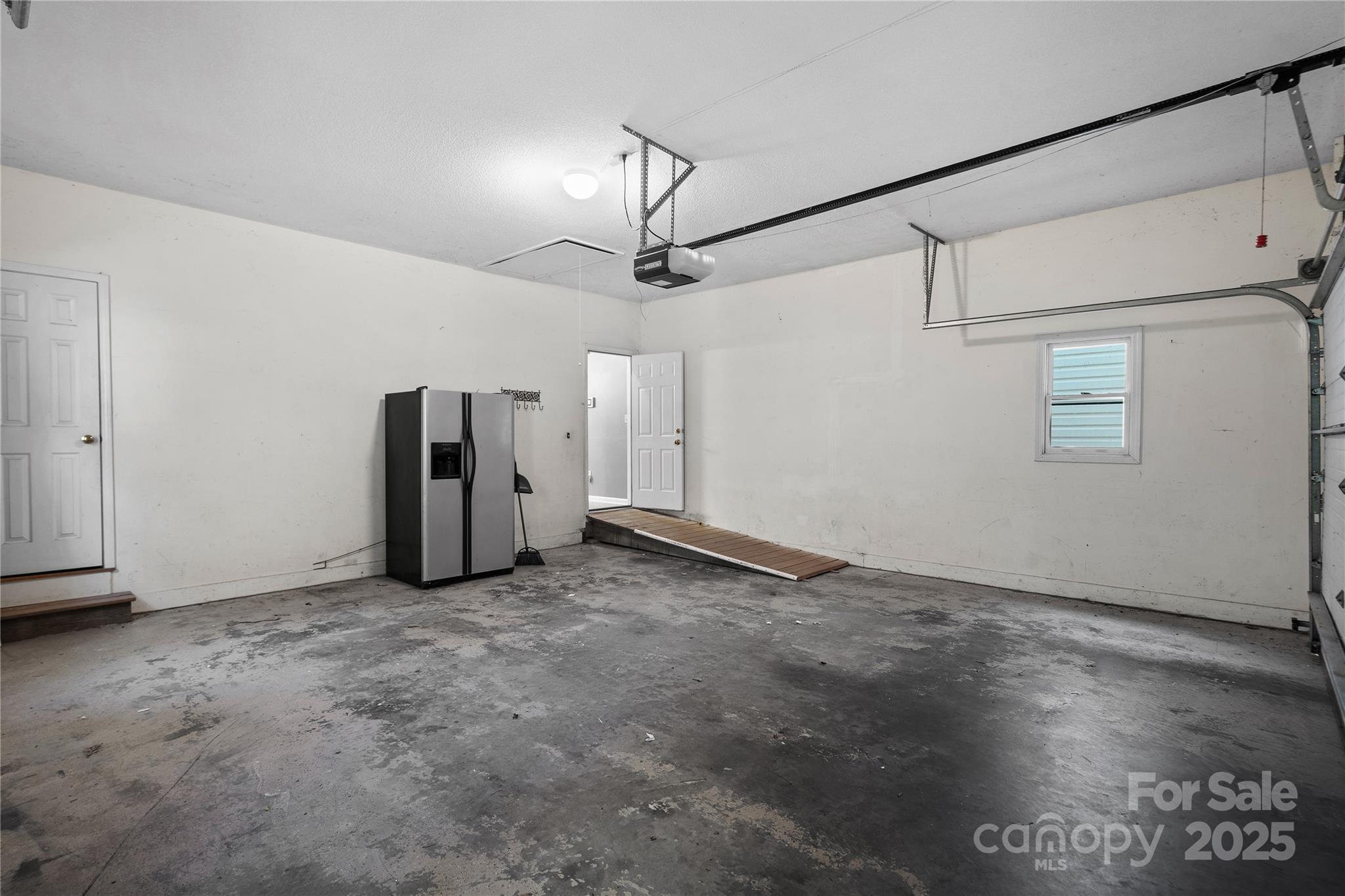 236 Woody Circle Tryon, NC 28782 - Photo 20 of 26 a view of an empty room with a window