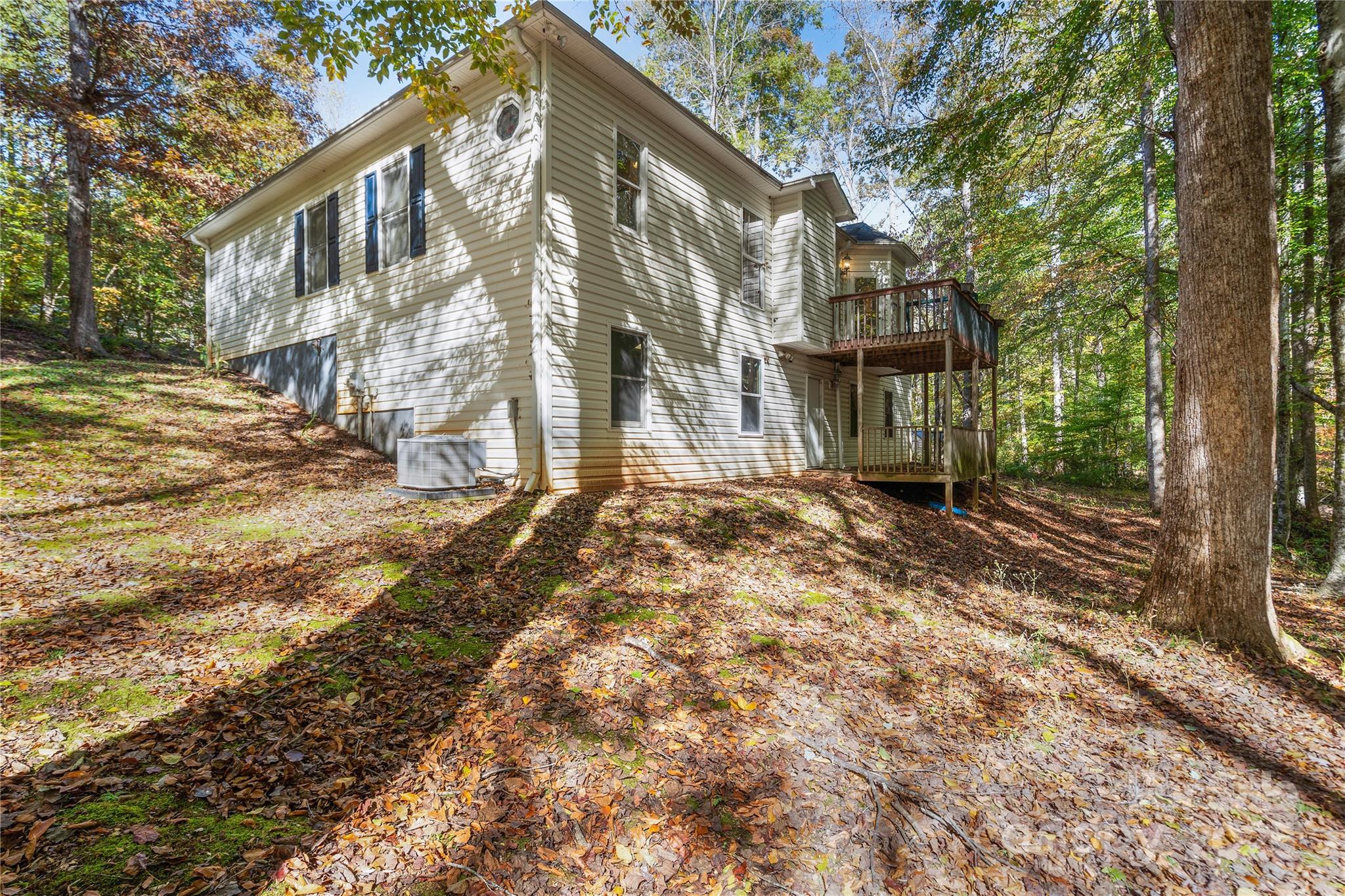236 Woody Circle Tryon, NC 28782 - Photo 21 of 26 a view of a house with a yard