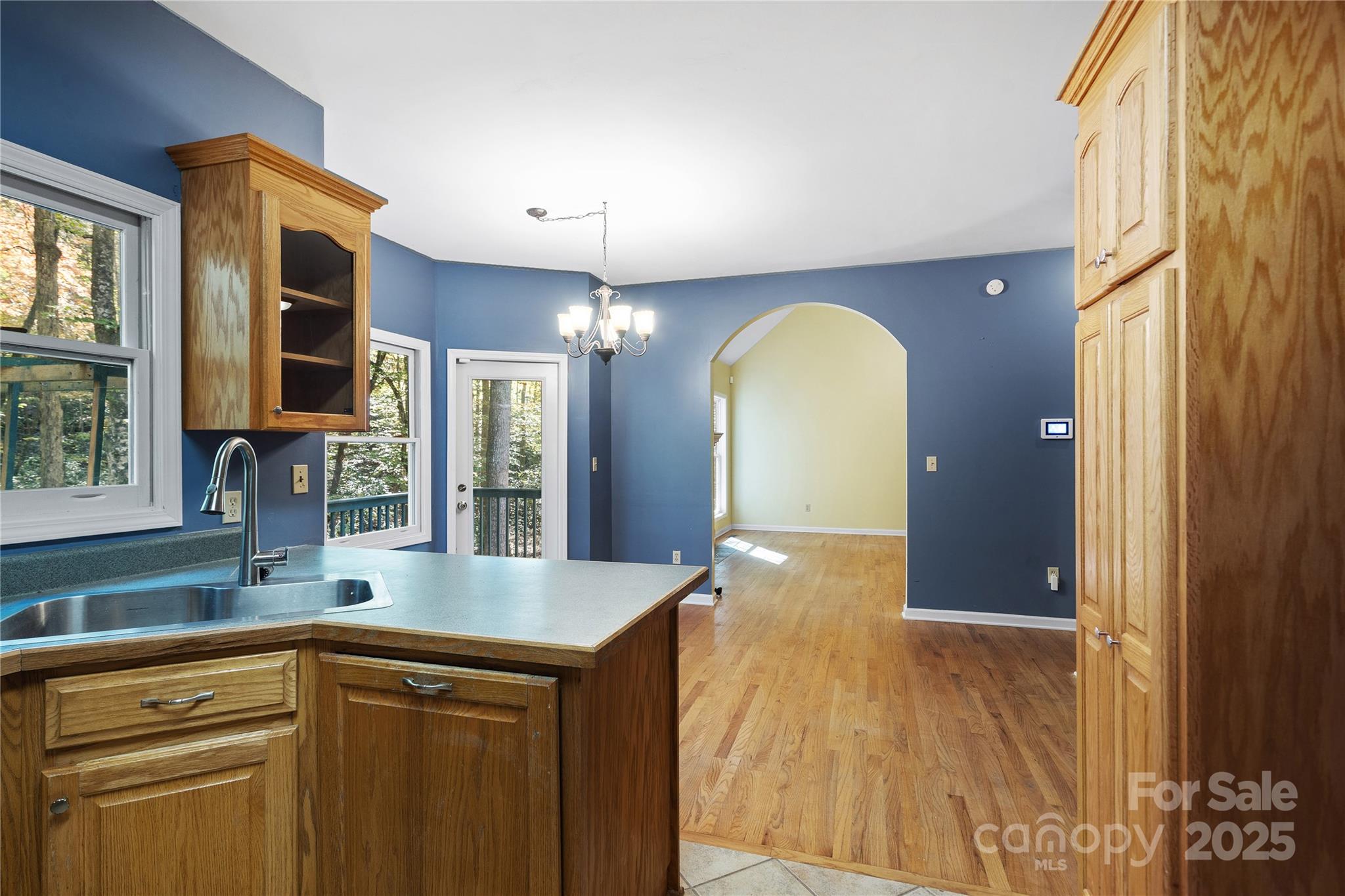236 Woody Circle Tryon, NC 28782 - Photo 8 of 26 a view of a bathroom sink and a mirror