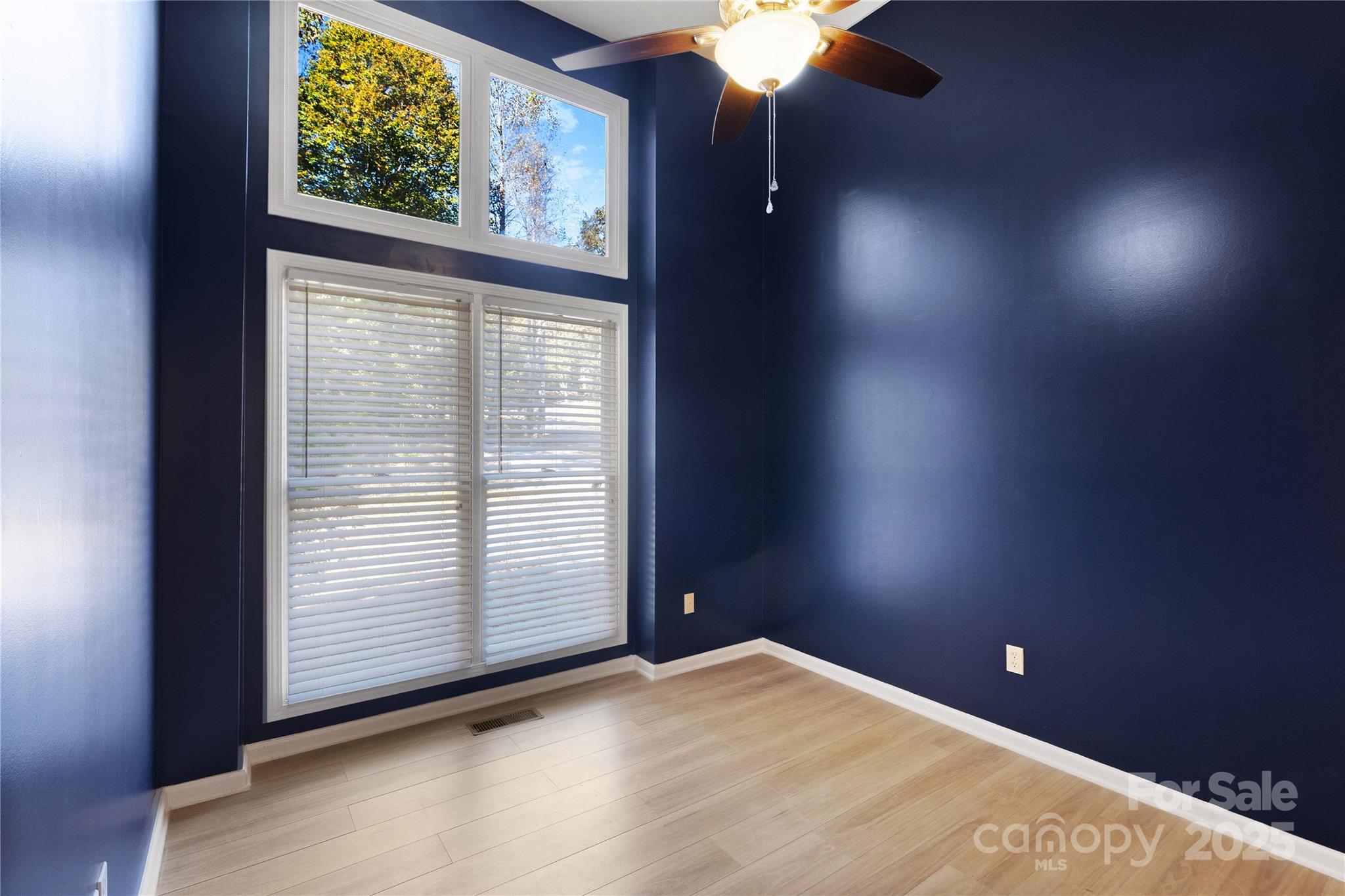 236 Woody Circle Tryon, NC 28782 - Photo 9 of 26 an empty room with windows