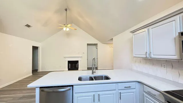 a bathroom with a toilet and a sink