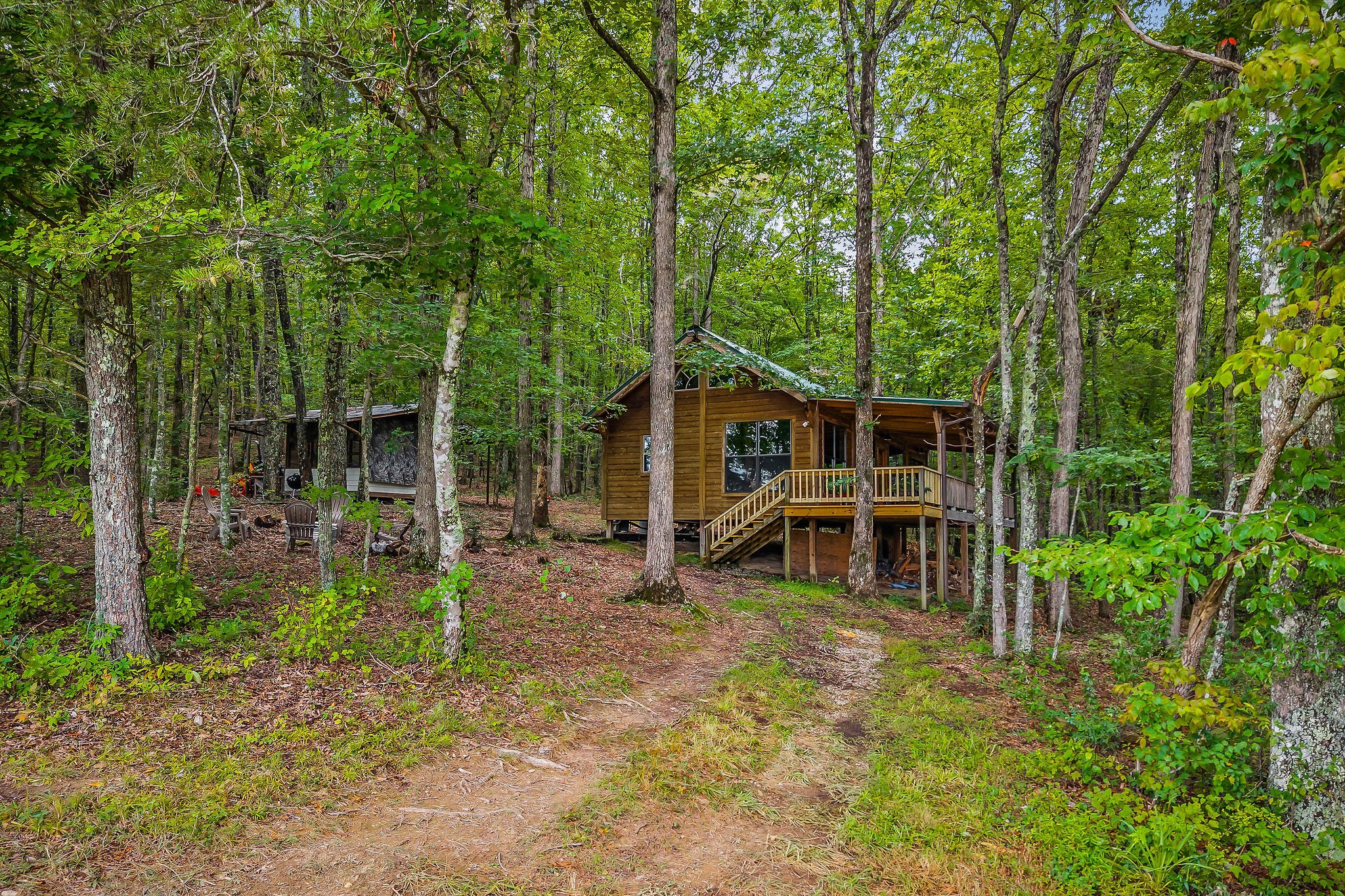 755 Music City Ranch Lane Sparta, TN 38583 - Photo 19 of 35 a view of a house with backyard and sitting area