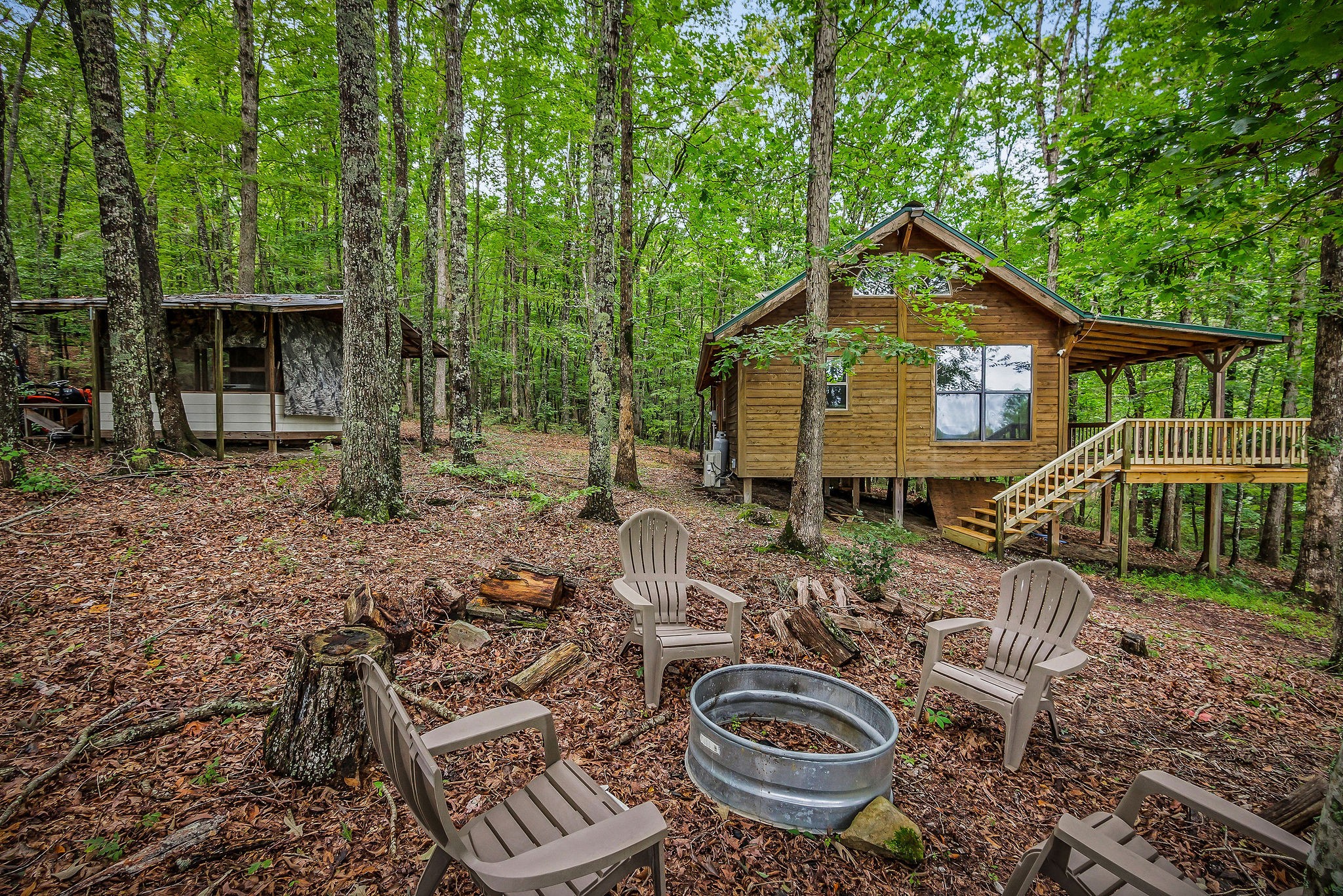 755 Music City Ranch Lane Sparta, TN 38583 - Photo 2 of 35 a view of a chairs and table in backyard