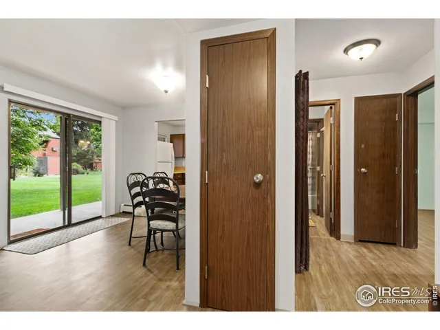 a living room with furniture and a gate