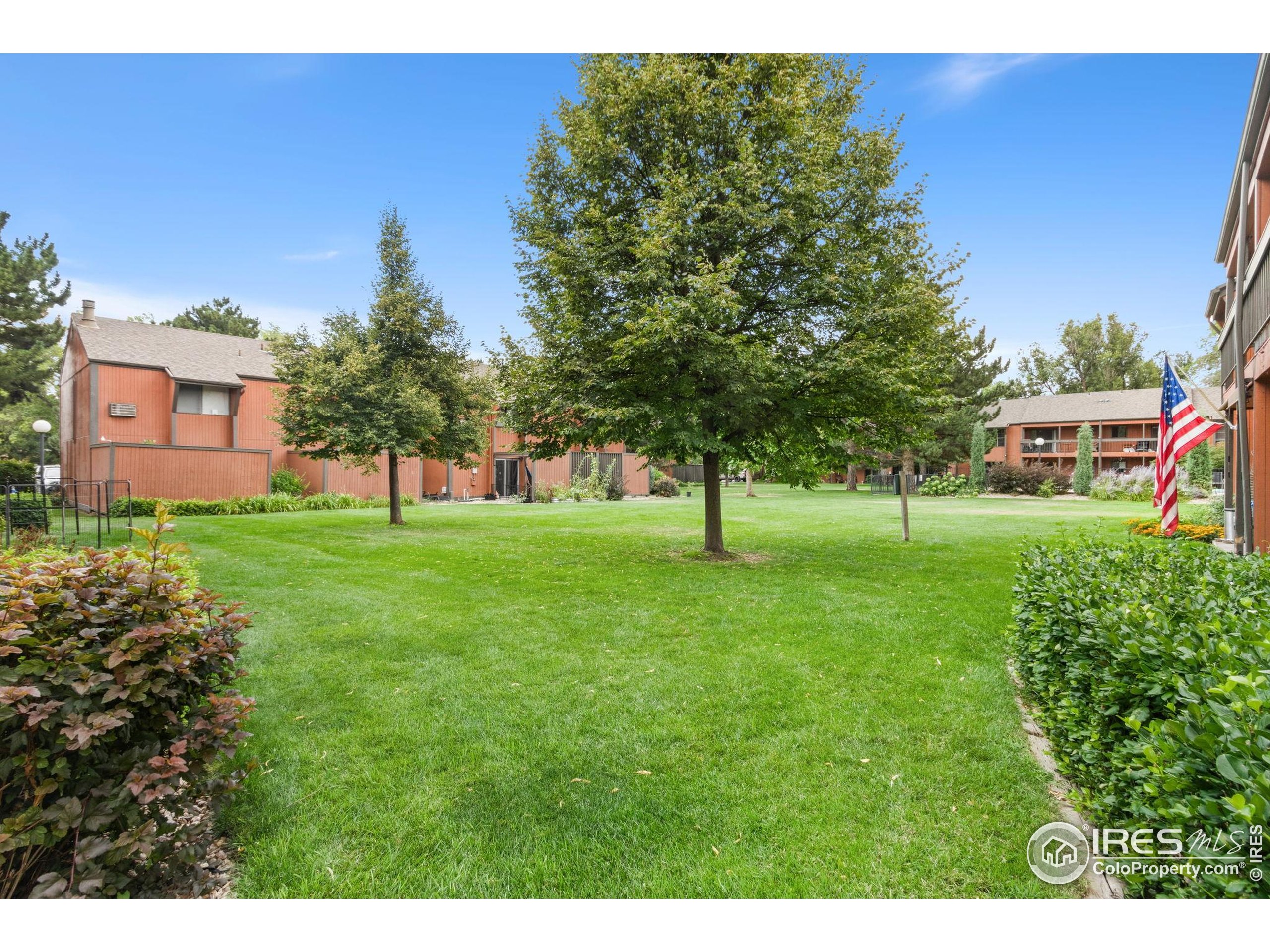 1625 West Elizabeth Street, Unit G2 Fort Collins, CO 80521 - Photo 28 of 45 a view of a trees with a big yard