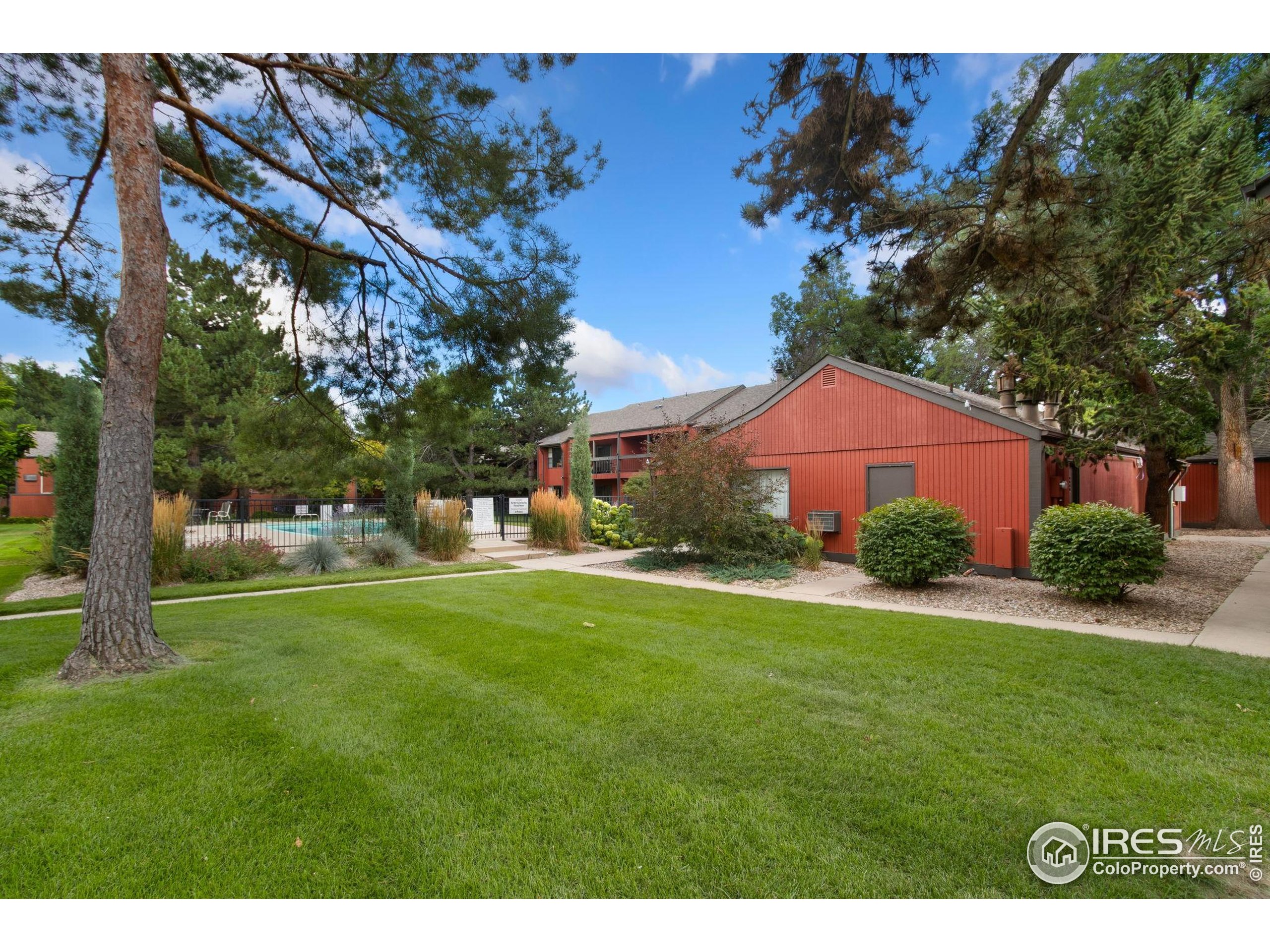 1625 West Elizabeth Street, Unit G2 Fort Collins, CO 80521 - Photo 31 of 45 a front view of a house with garden