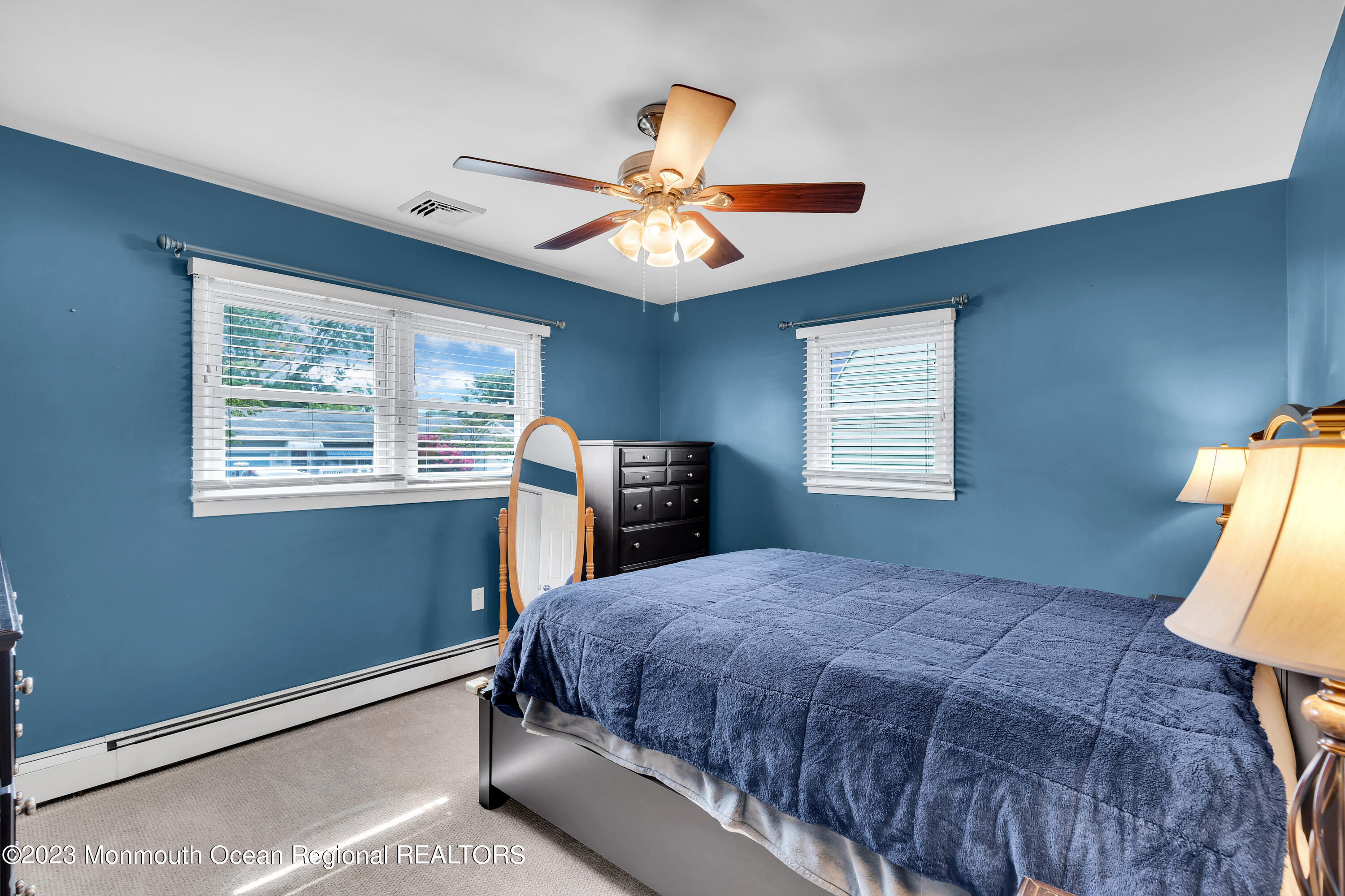 1313 Sleepy Hollow Road Point Pleasant, NJ 08742 - Photo 18 of 34 a bedroom with a bed and a window