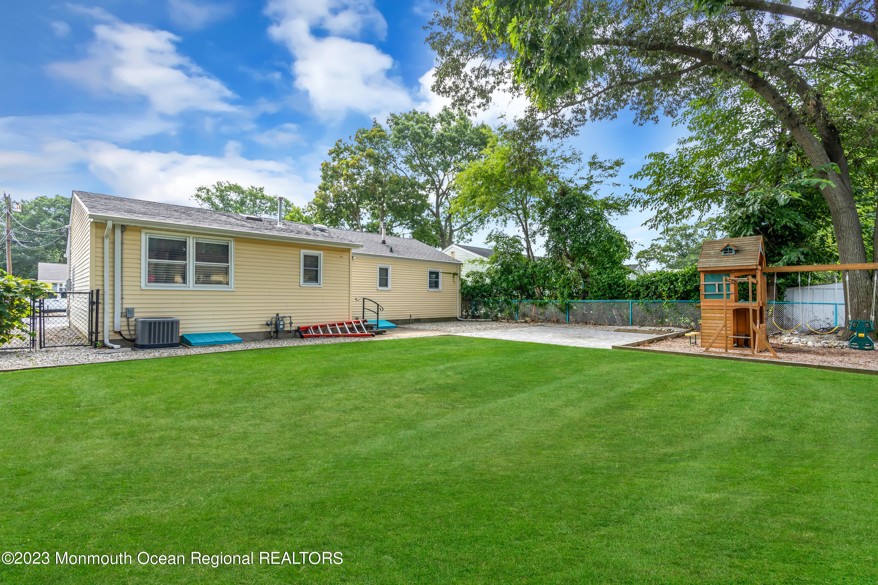 1313 Sleepy Hollow Road Point Pleasant, NJ 08742 - Photo 6 of 34 a view of a house with backyard and sitting area