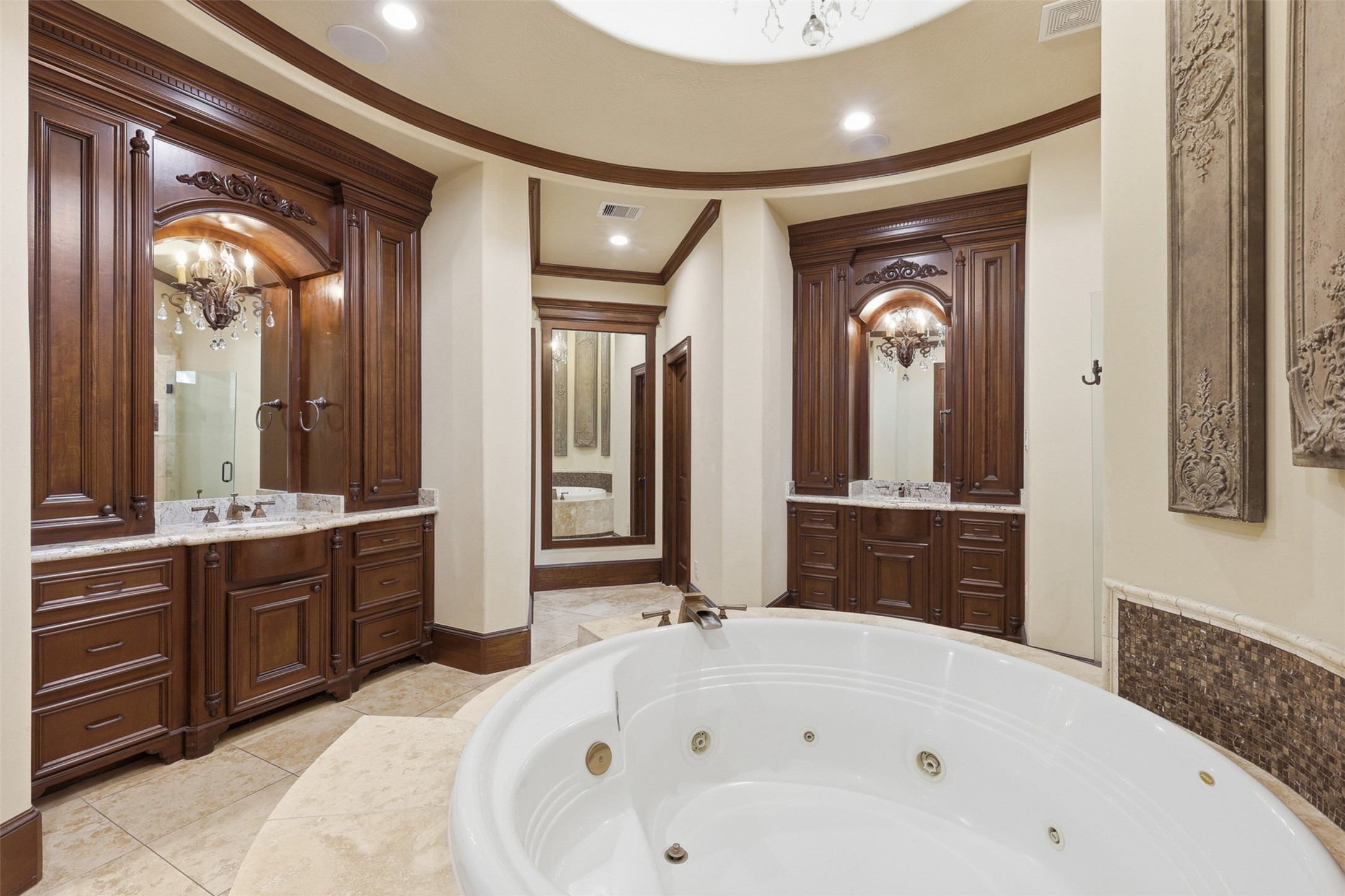 14 Post Shadow Estate Drive Spring, TX 77389 - Photo 39 of 49 a bathroom with a tub a double vanity sink and a large mirror