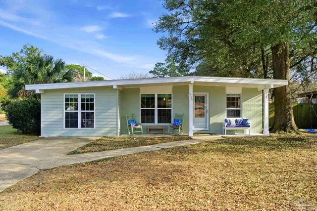 front view of a house with a patio