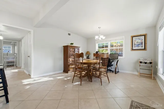 a dining room well furnished