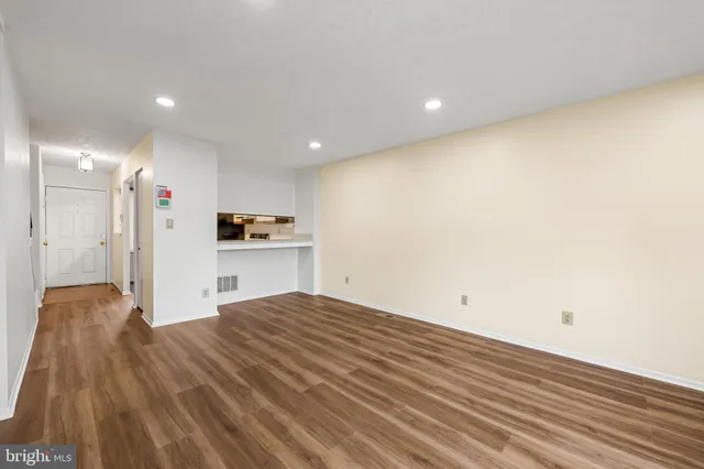 a view of kitchen with wooden floor