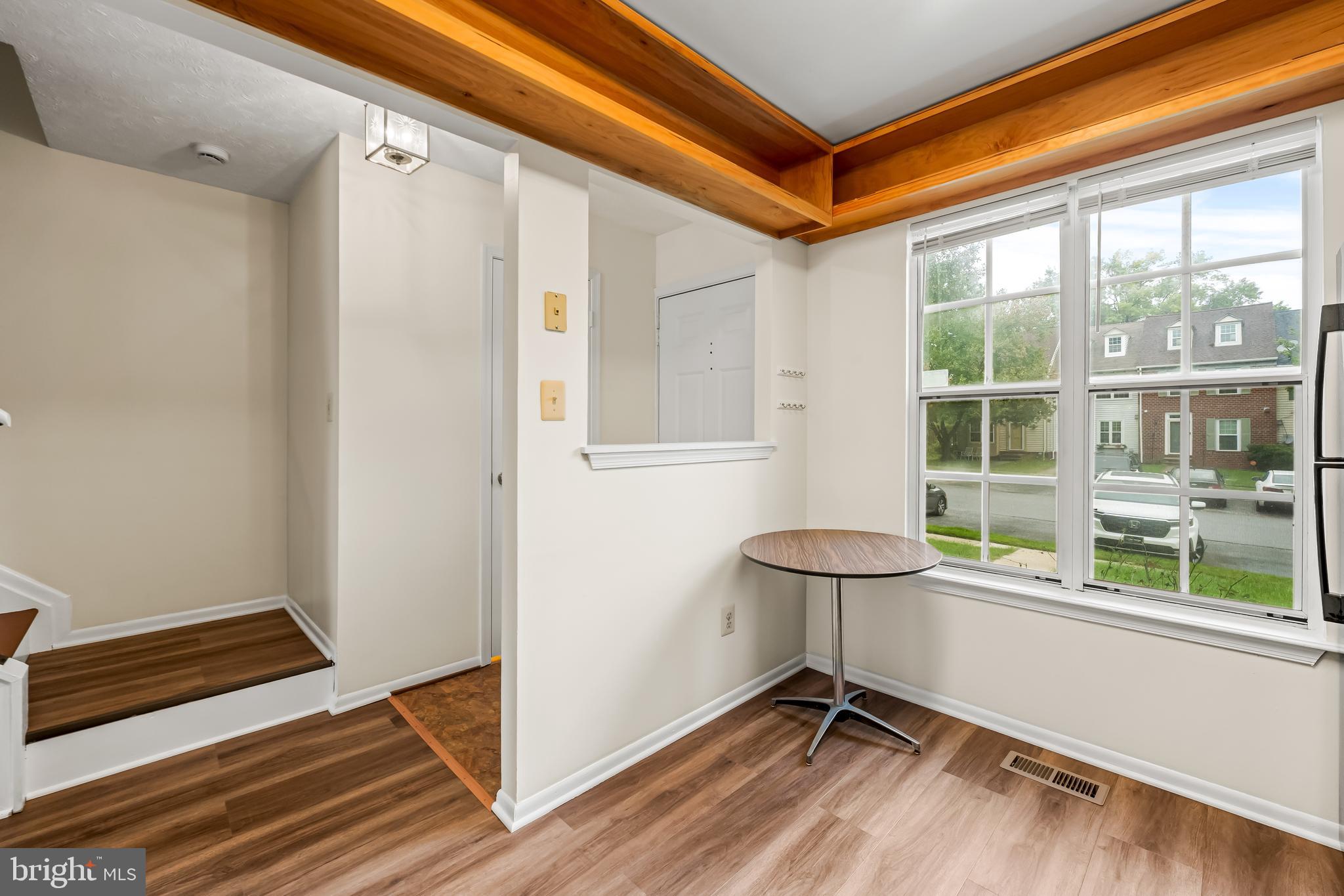 6953 Rockfield Road Baltimore, MD 21244 - Photo 9 of 31 a view of a room with window and a table