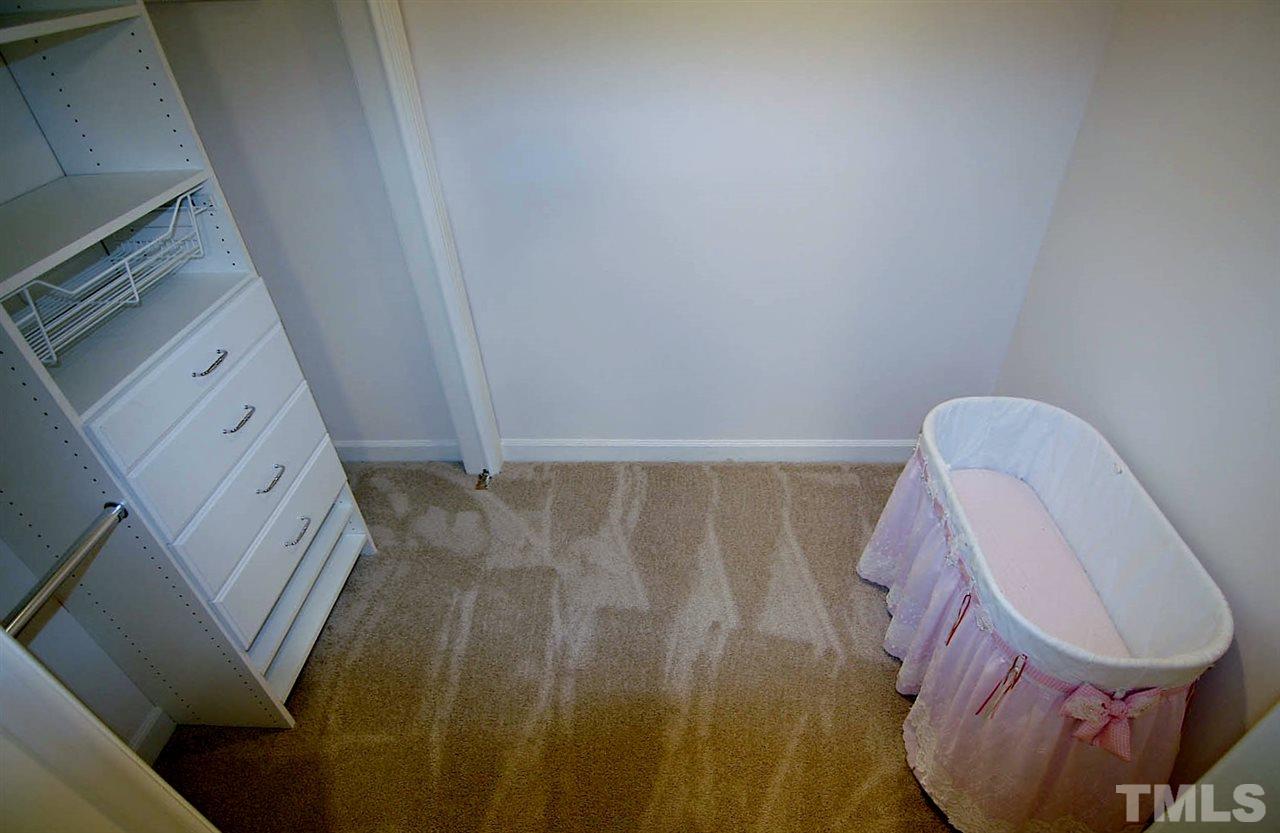 2001 Countrywood Road North Raleigh, NC 27615 - Photo 17 of 25 a bathroom with a sink and toilet