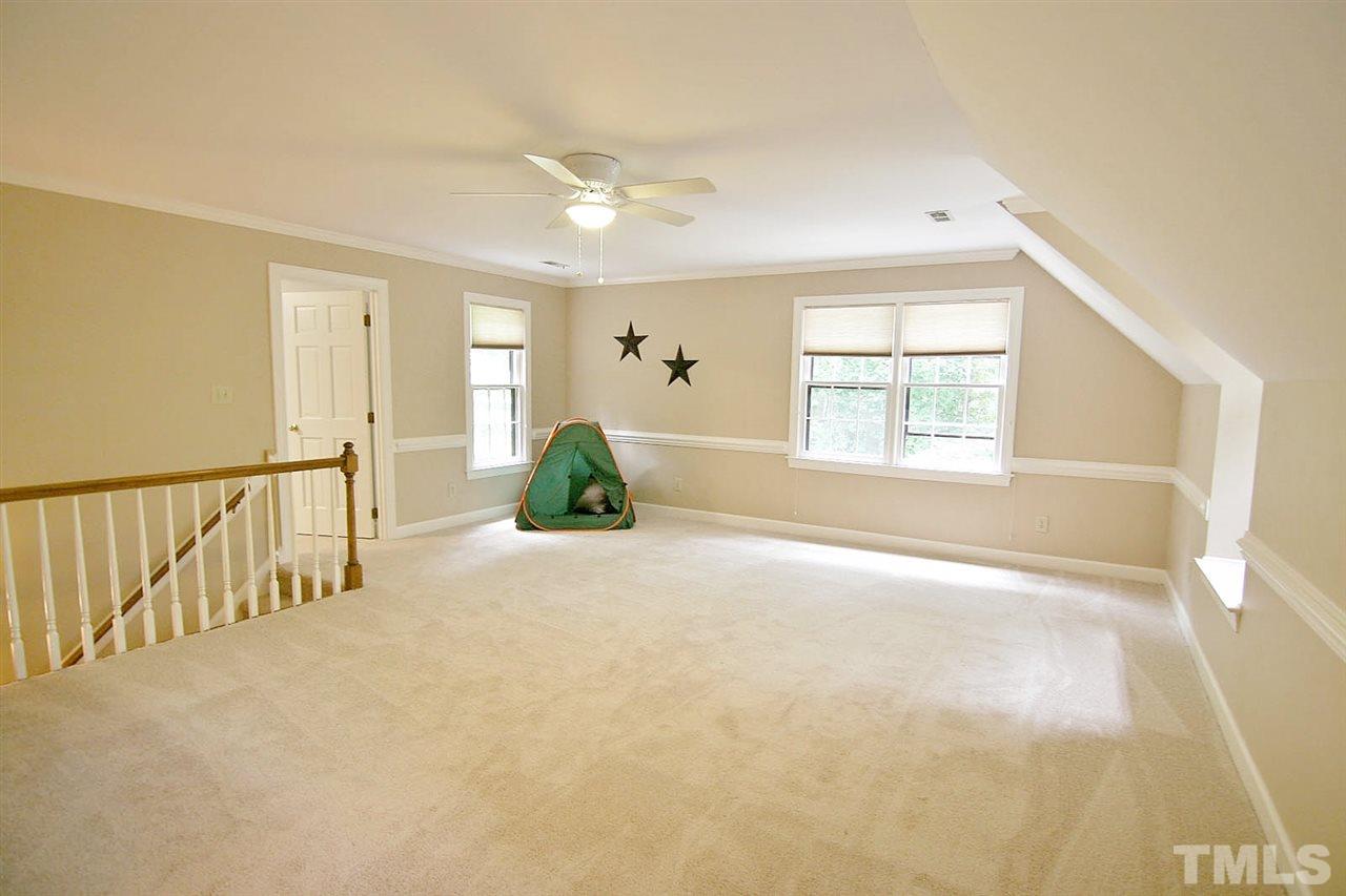 2001 Countrywood Road North Raleigh, NC 27615 - Photo 20 of 25 a view of an empty room with a window