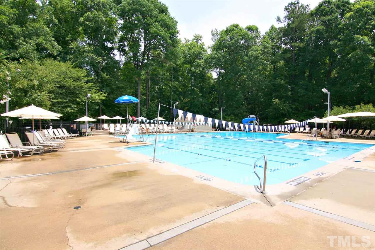 2001 Countrywood Road North Raleigh, NC 27615 - Photo 23 of 25 a view of a swimming pool with an outdoor seating