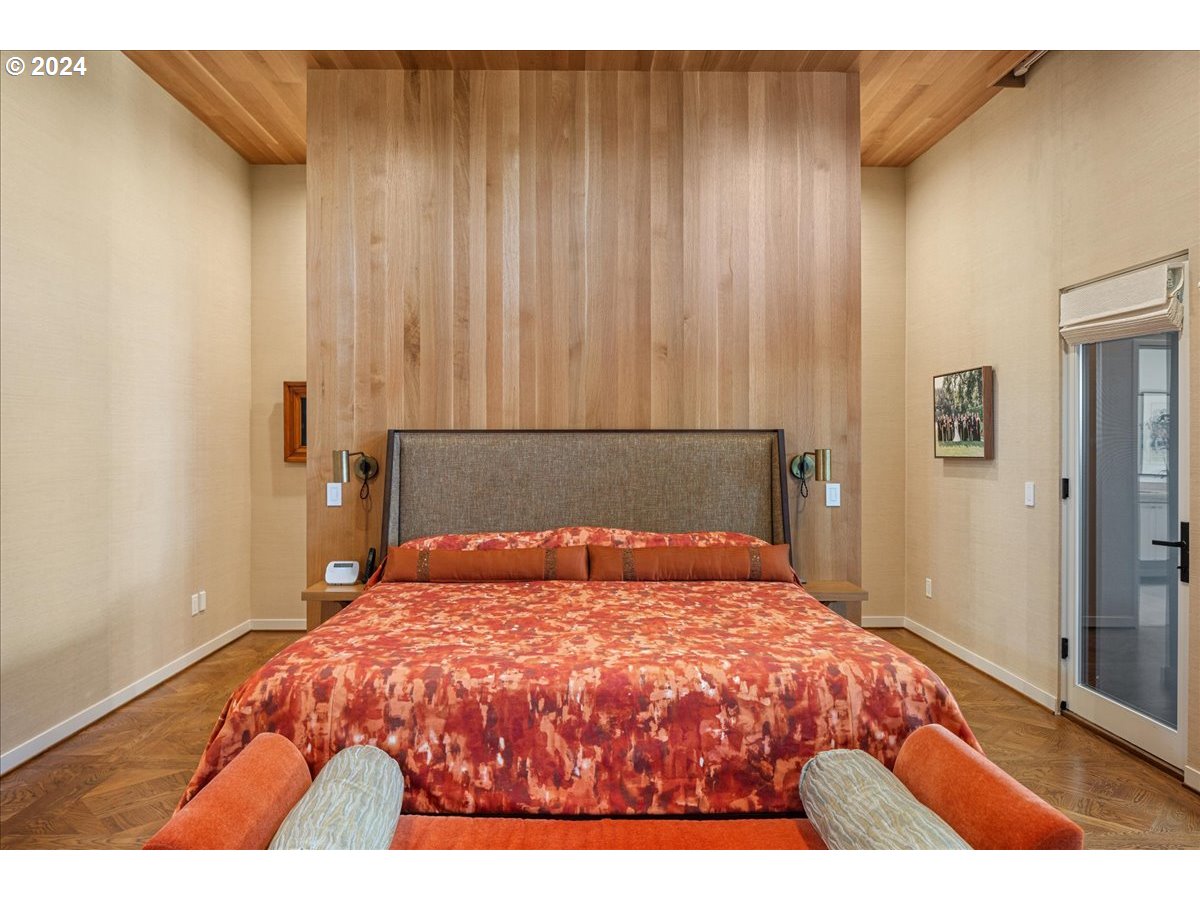 1933 Highlands Loop Lake Oswego, OR 97034 - Photo 18 of 48 a bedroom with a bed and a night stand