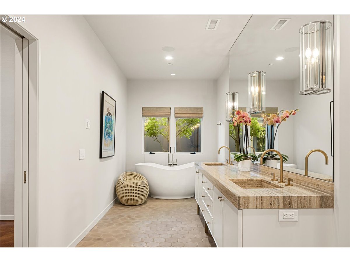 1933 Highlands Loop Lake Oswego, OR 97034 - Photo 21 of 48 a bathroom with a sink and a mirror