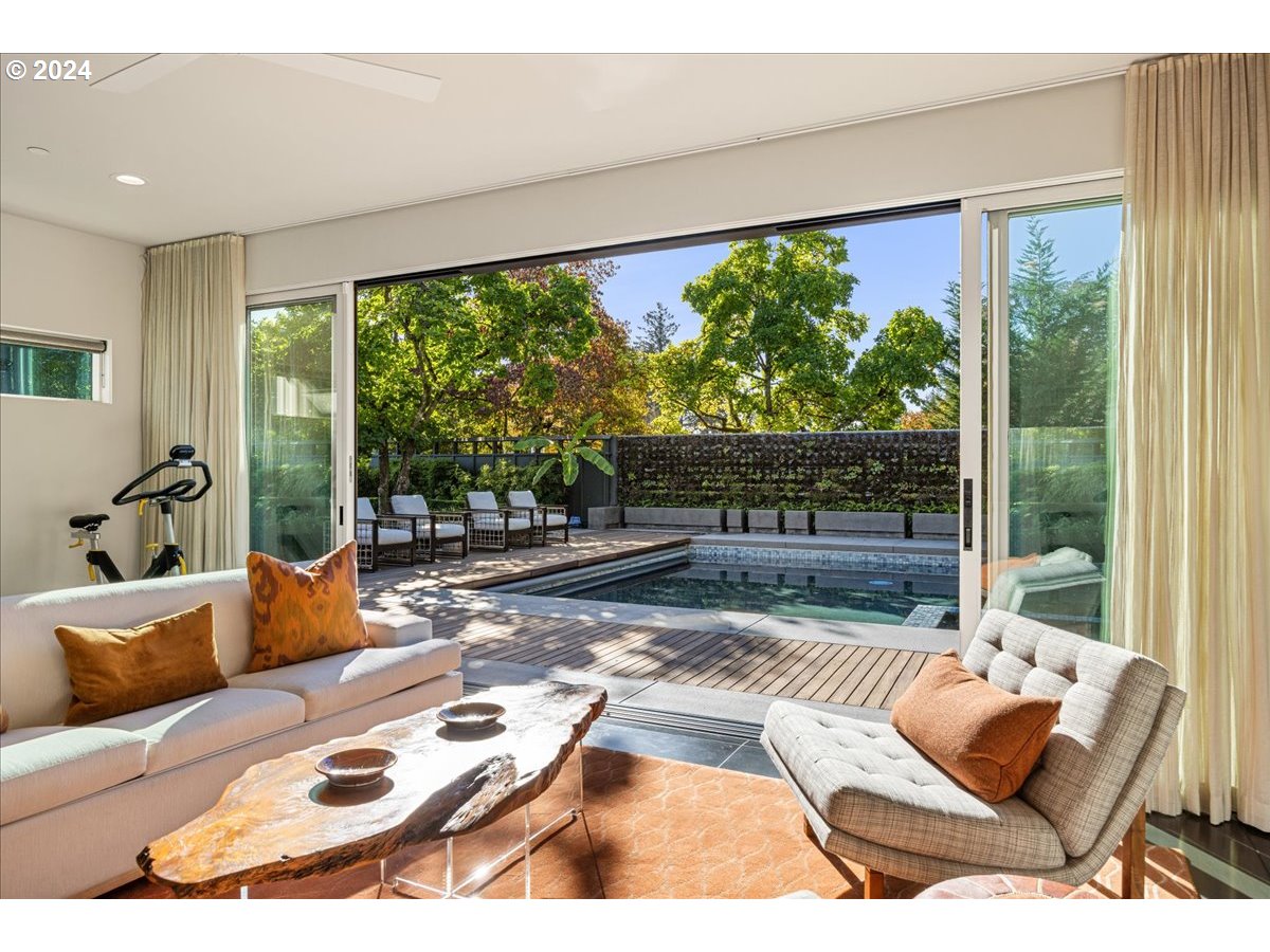 1933 Highlands Loop Lake Oswego, OR 97034 - Photo 27 of 48 a bedroom with furniture and a large window