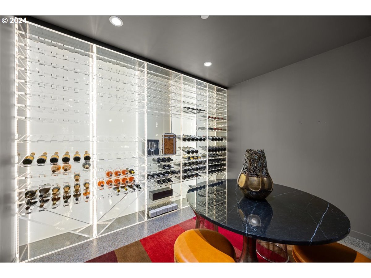1933 Highlands Loop Lake Oswego, OR 97034 - Photo 37 of 48 a living room with furniture and a floor to ceiling window
