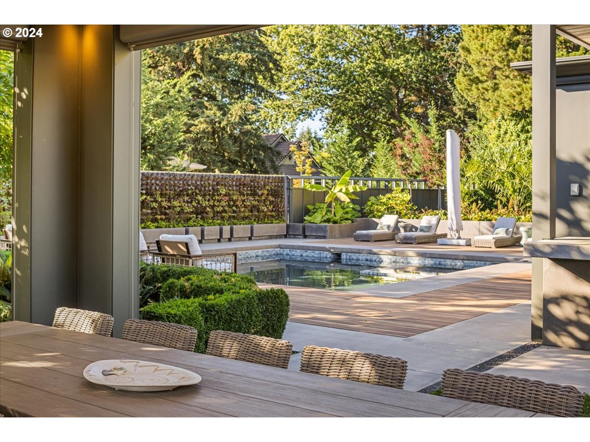 1933 Highlands Loop Lake Oswego, OR 97034 - Photo 42 of 48 a view of a porch with furniture and floor to ceiling window