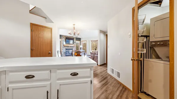 a view of a kitchen from the hallway
