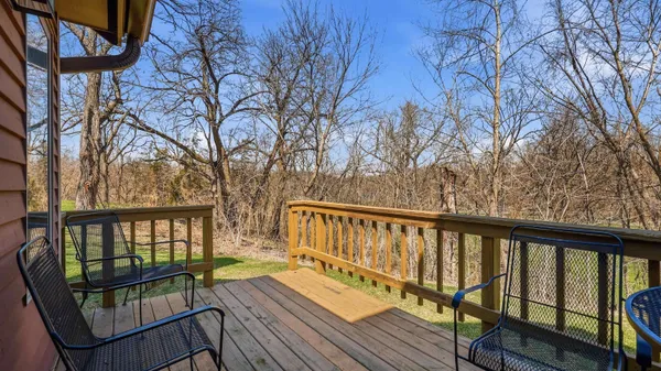 a view of a house with backyard porch and sitting area
