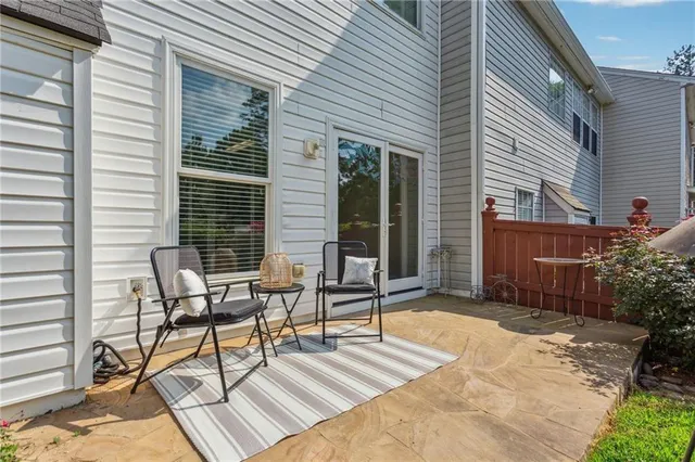 a backyard of a house with seating space
