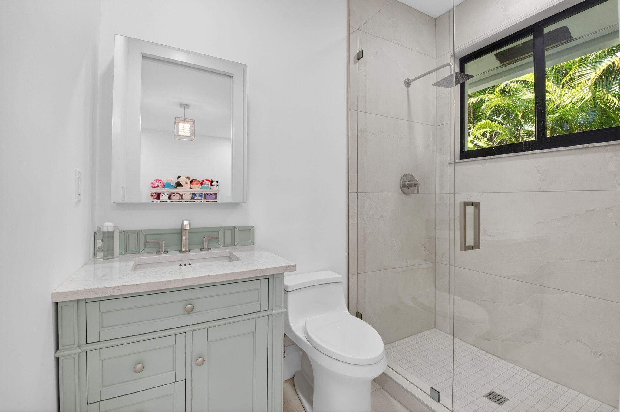 5723 Hamilton Way Boca Raton, FL 33496 - Photo 30 of 111 a bathroom with a sink a toilet and shower