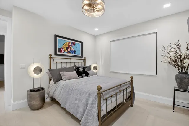 a view of swimming pool from a balcony