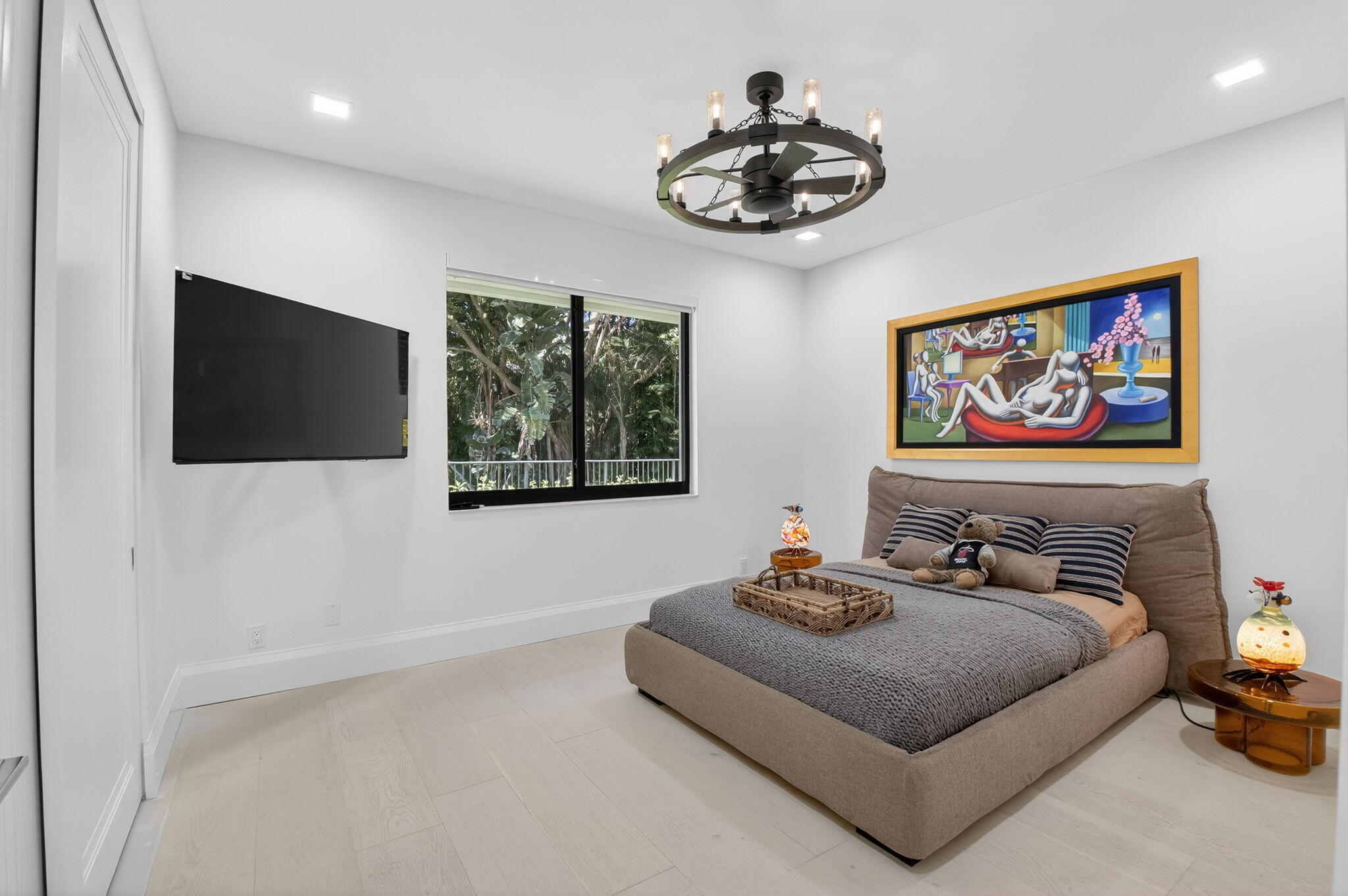 5723 Hamilton Way Boca Raton, FL 33496 - Photo 35 of 111 a bedroom with furniture and a flat screen tv