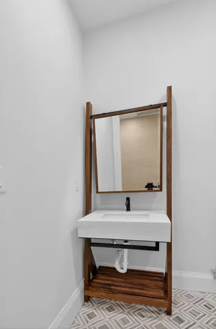 a view of a lake with houses in the back