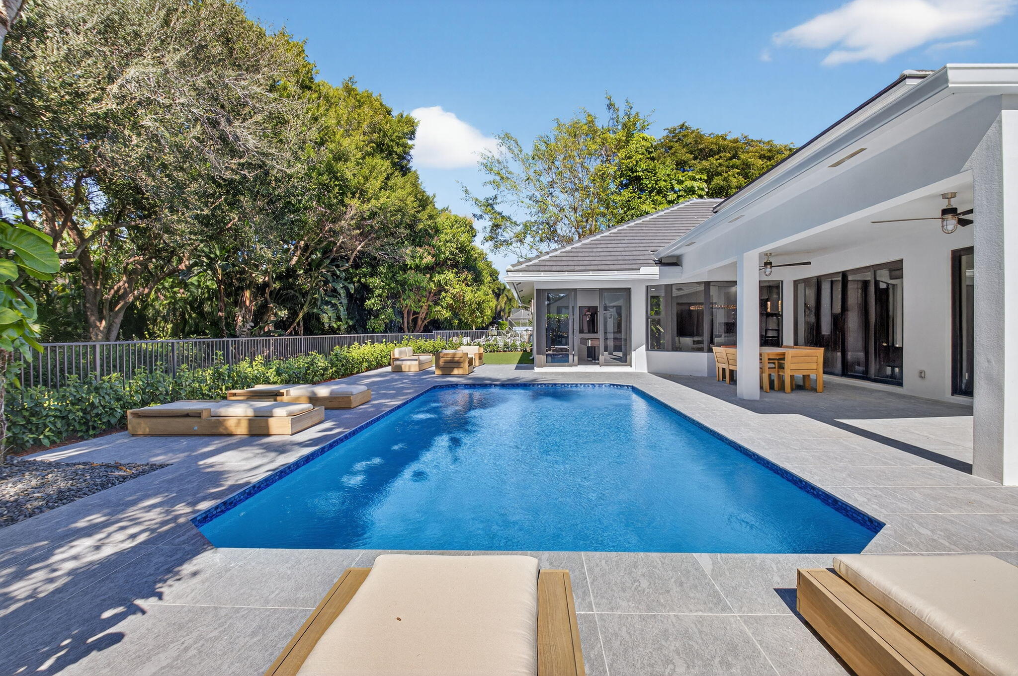 5723 Hamilton Way Boca Raton, FL 33496 - Photo 56 of 111 swimming pool view with a seating space