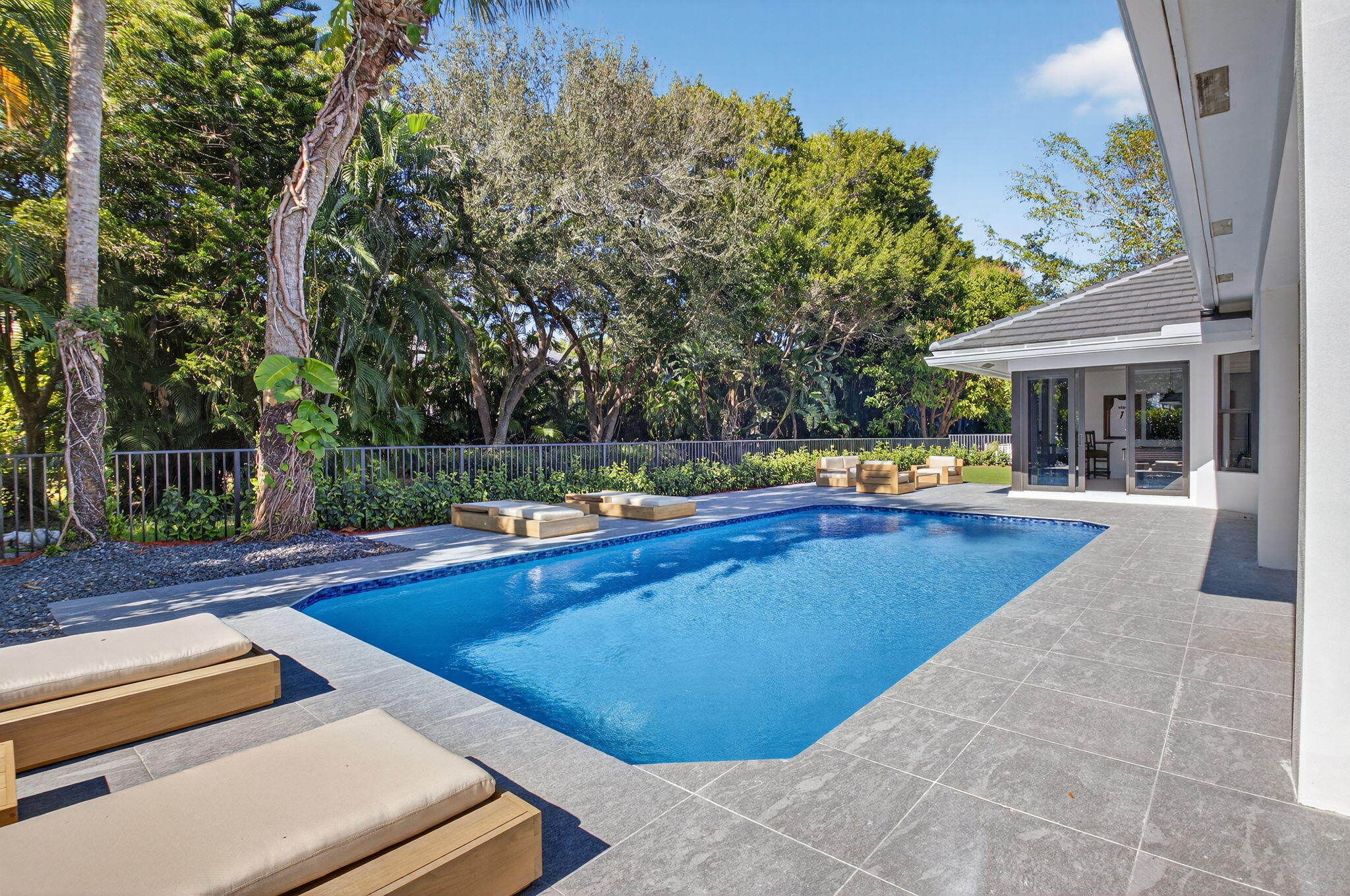 5723 Hamilton Way Boca Raton, FL 33496 - Photo 57 of 111 a view of outdoor space yard swimming pool and patio