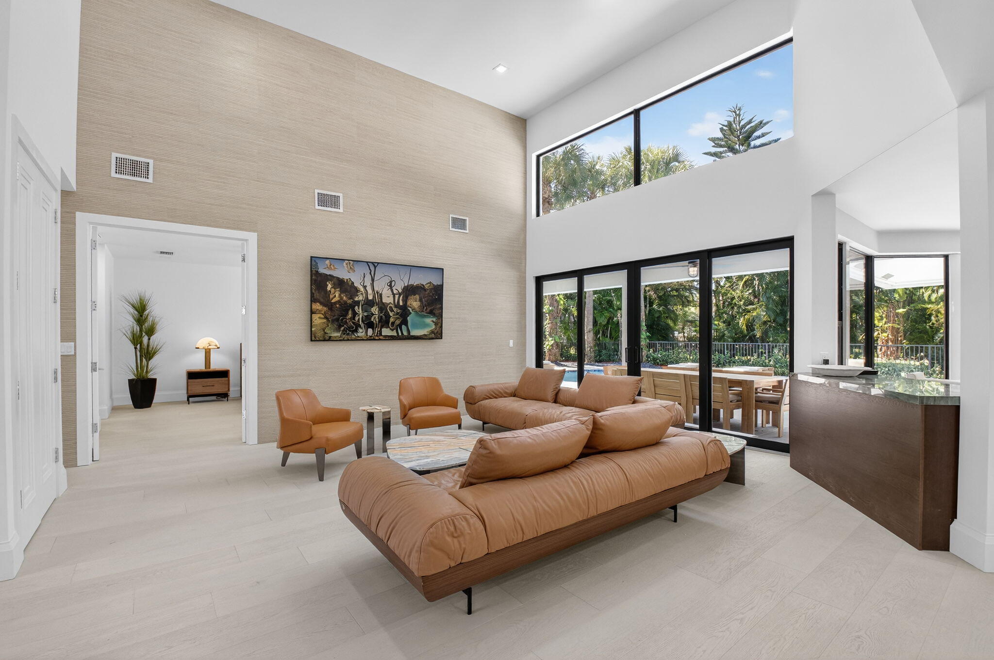 5723 Hamilton Way Boca Raton, FL 33496 - Photo 9 of 111 a living room with furniture and large windows